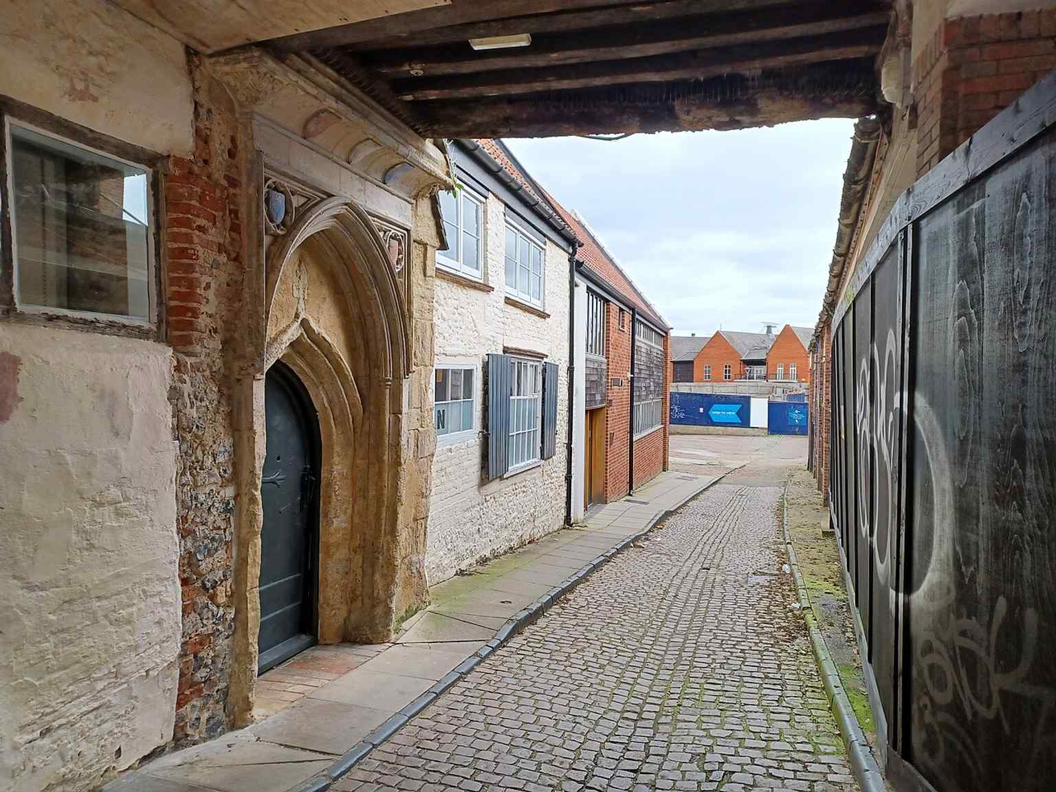 A modern exterior angle that helps place Dragon Hall in the city today, beside the route once used by medieval merchants.
