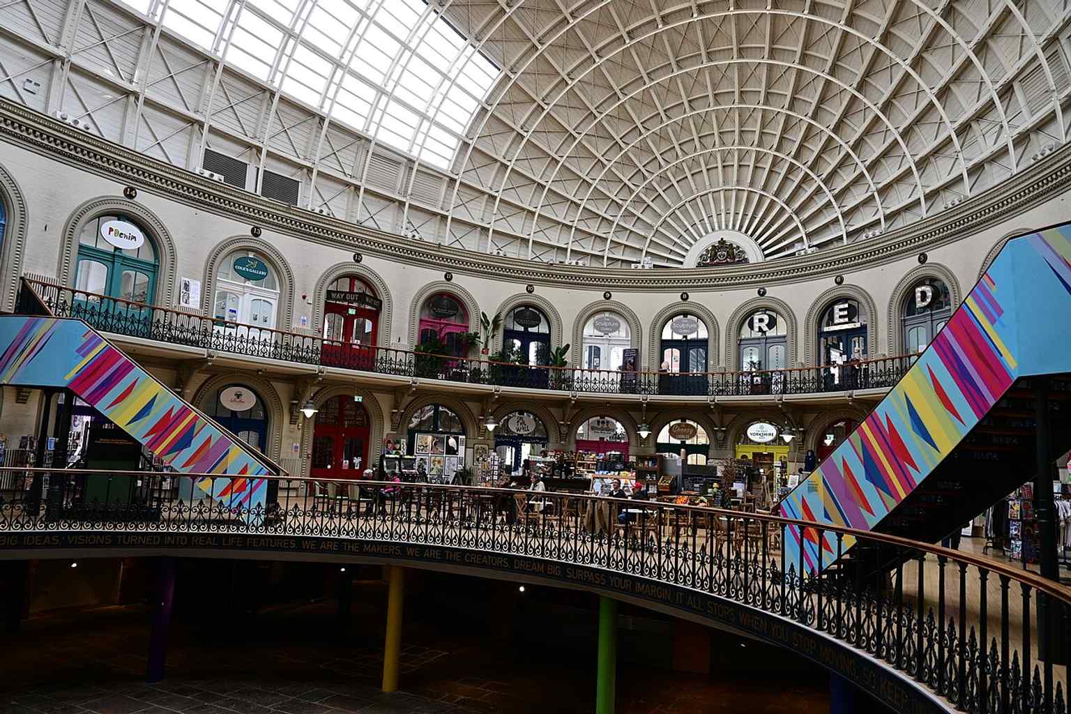 Another view of the decorated stair, highlighting how the restored interior now mixes heritage architecture with contemporary art.