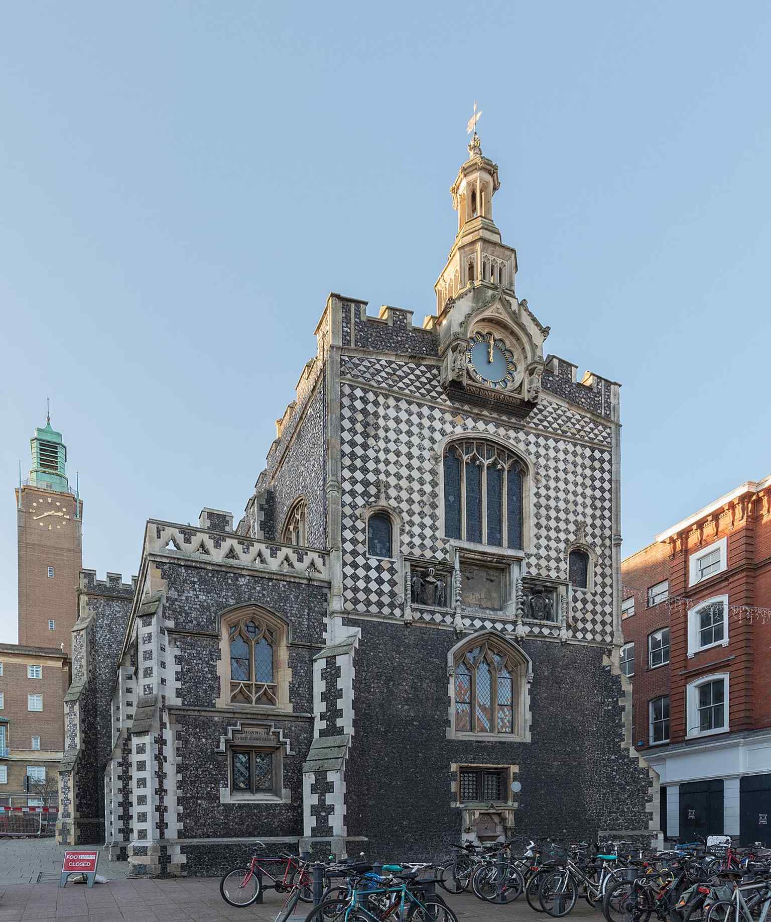 A crisp modern view of Norwich Guildhall, a Grade I listed landmark whose east end was rebuilt in the 1530s after earlier structural collapse.