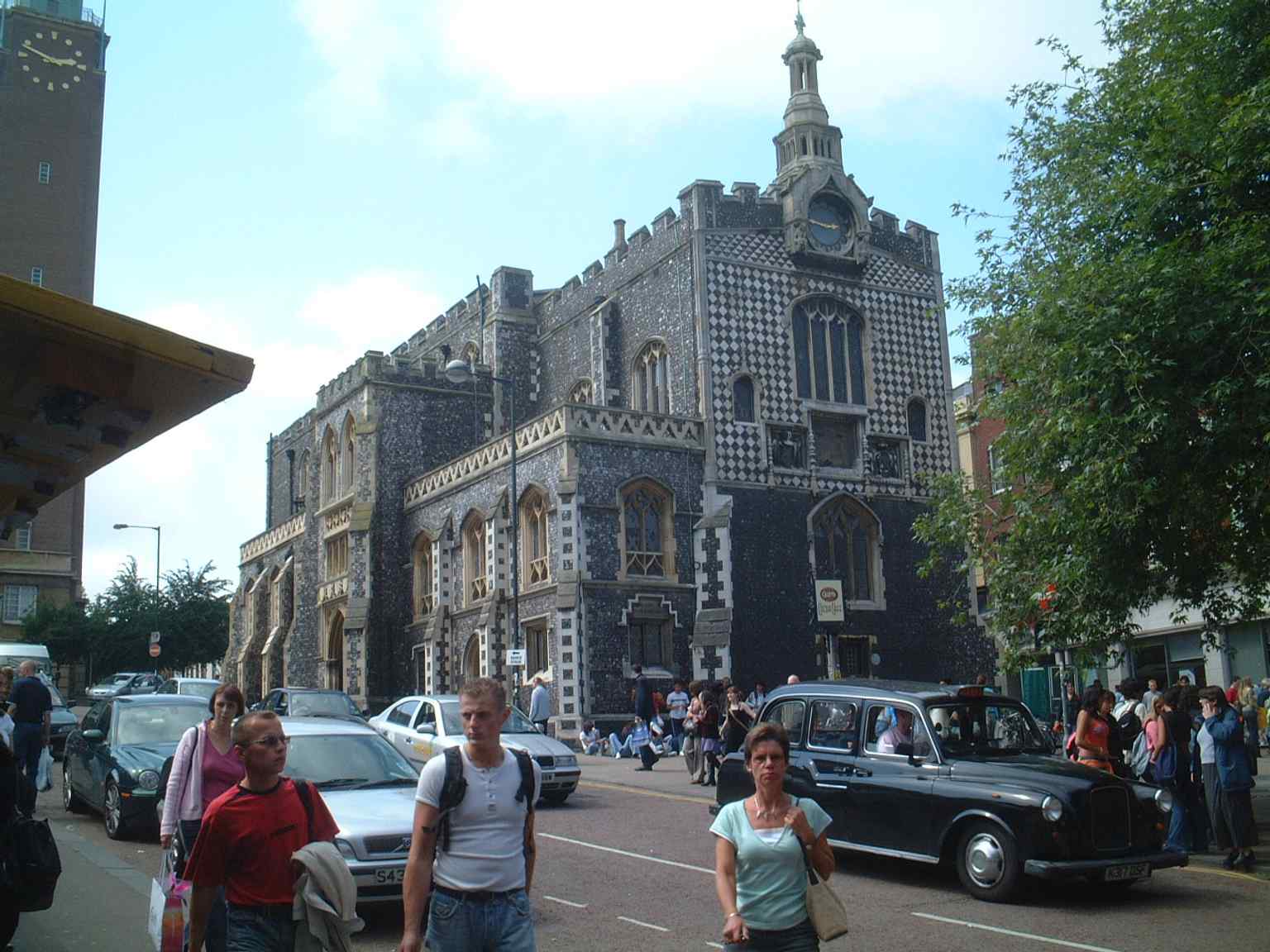 An older image of Norwich Gaol by the Guildhall, linking the site to the building’s former roles as a court and prison, including the dungeon where Thomas Bilney was held.
