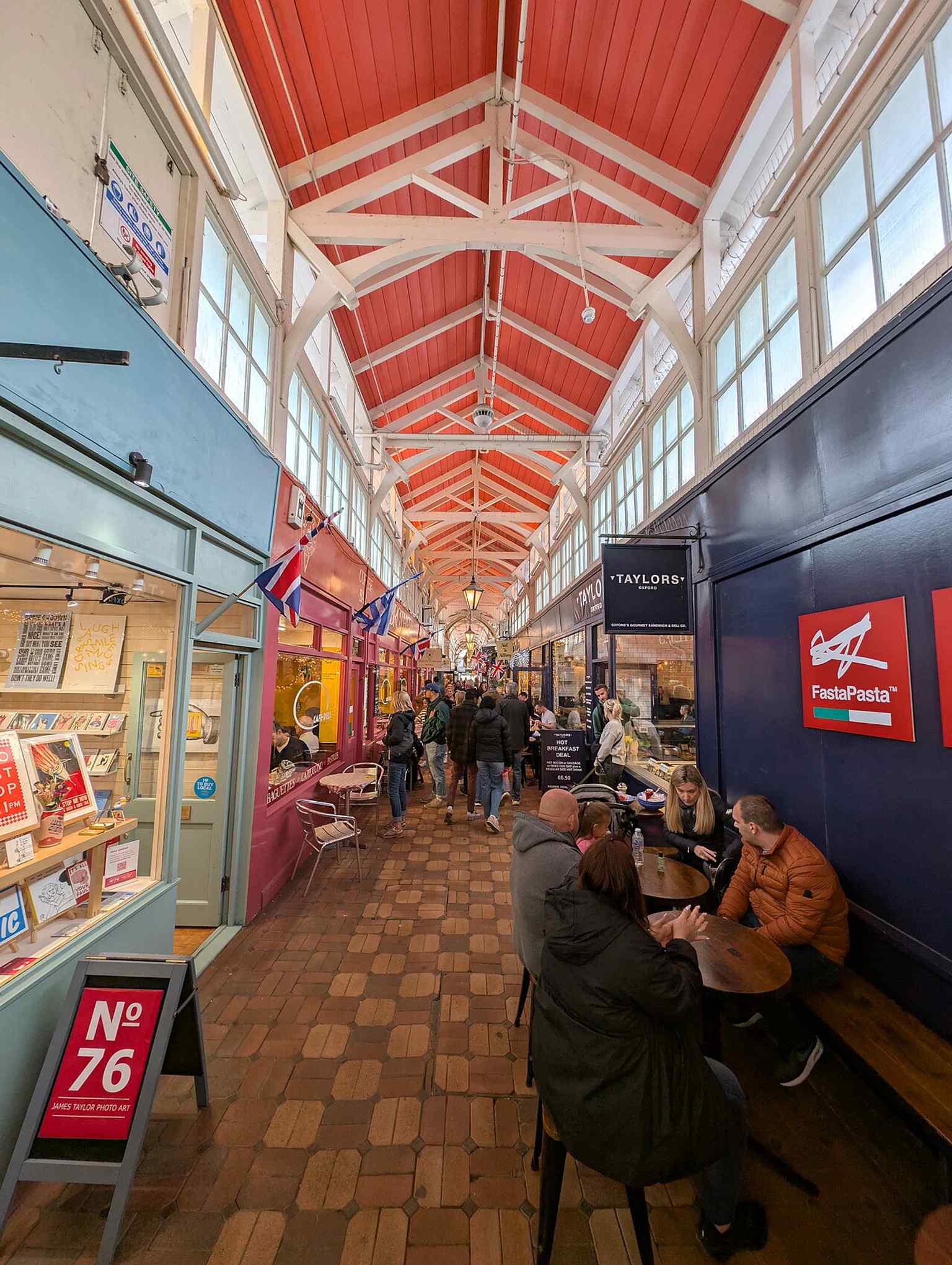 A clear modern exterior view of the Covered Market, showing the preserved building that has been in continuous use since 1774.
