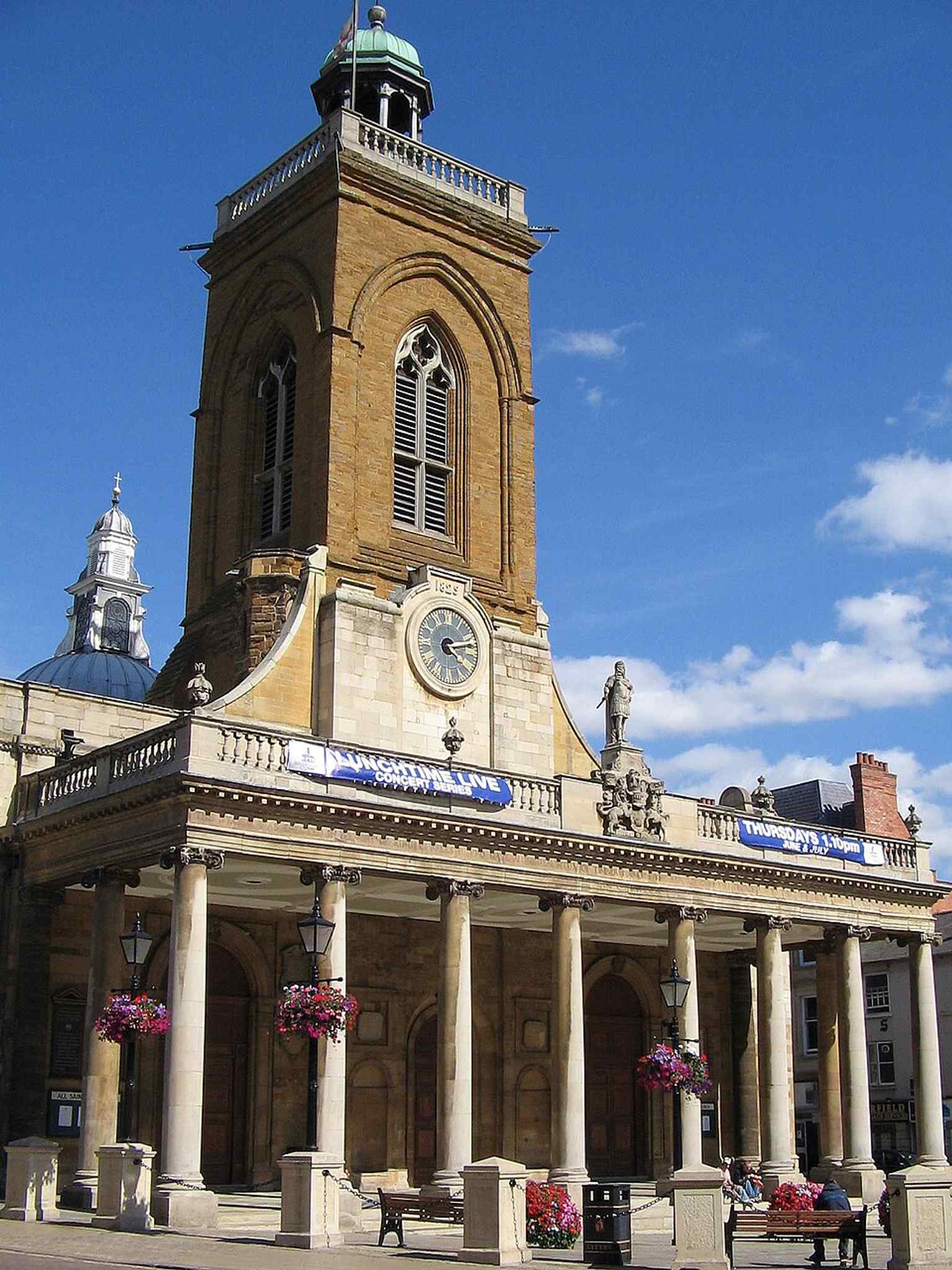 The west front of All Saints’ Church, where the 1701 portico was added in memory of Charles II’s help after the Great Fire.
