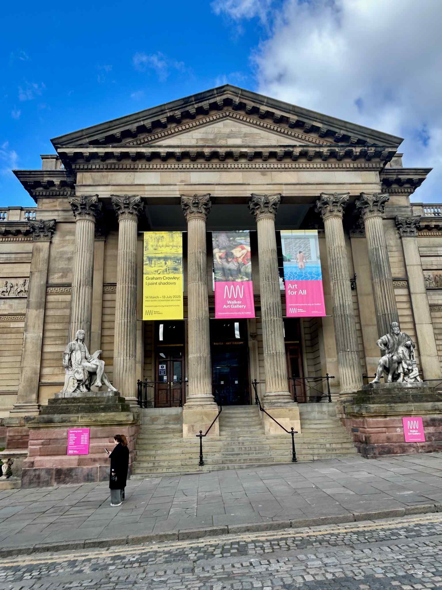 The Walker’s entrance dressed for a contemporary exhibition, showing how the historic building continues to host major temporary shows while remaining a free public gallery.