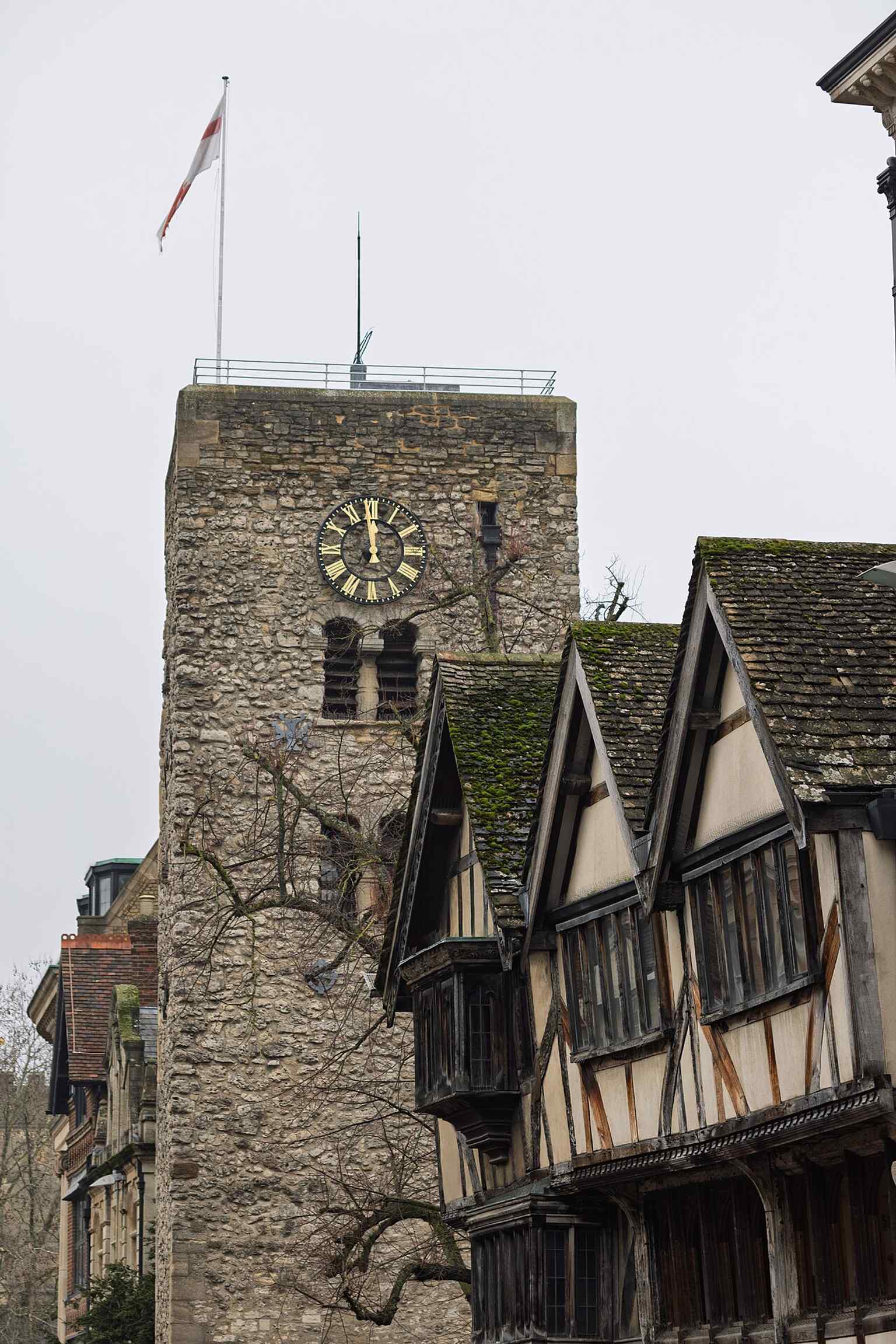 The church on busy Cornmarket Street, showing its position right by the historic North Gate site where Oxford’s city wall once stood.