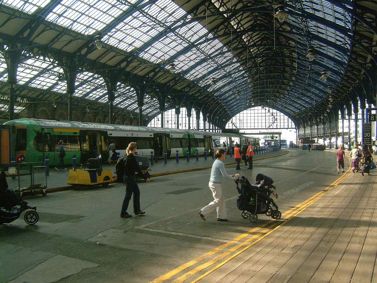 Platforms 7 and 8 beneath the great curved roof — the busiest end of the station for East Coastway services and football traffic.