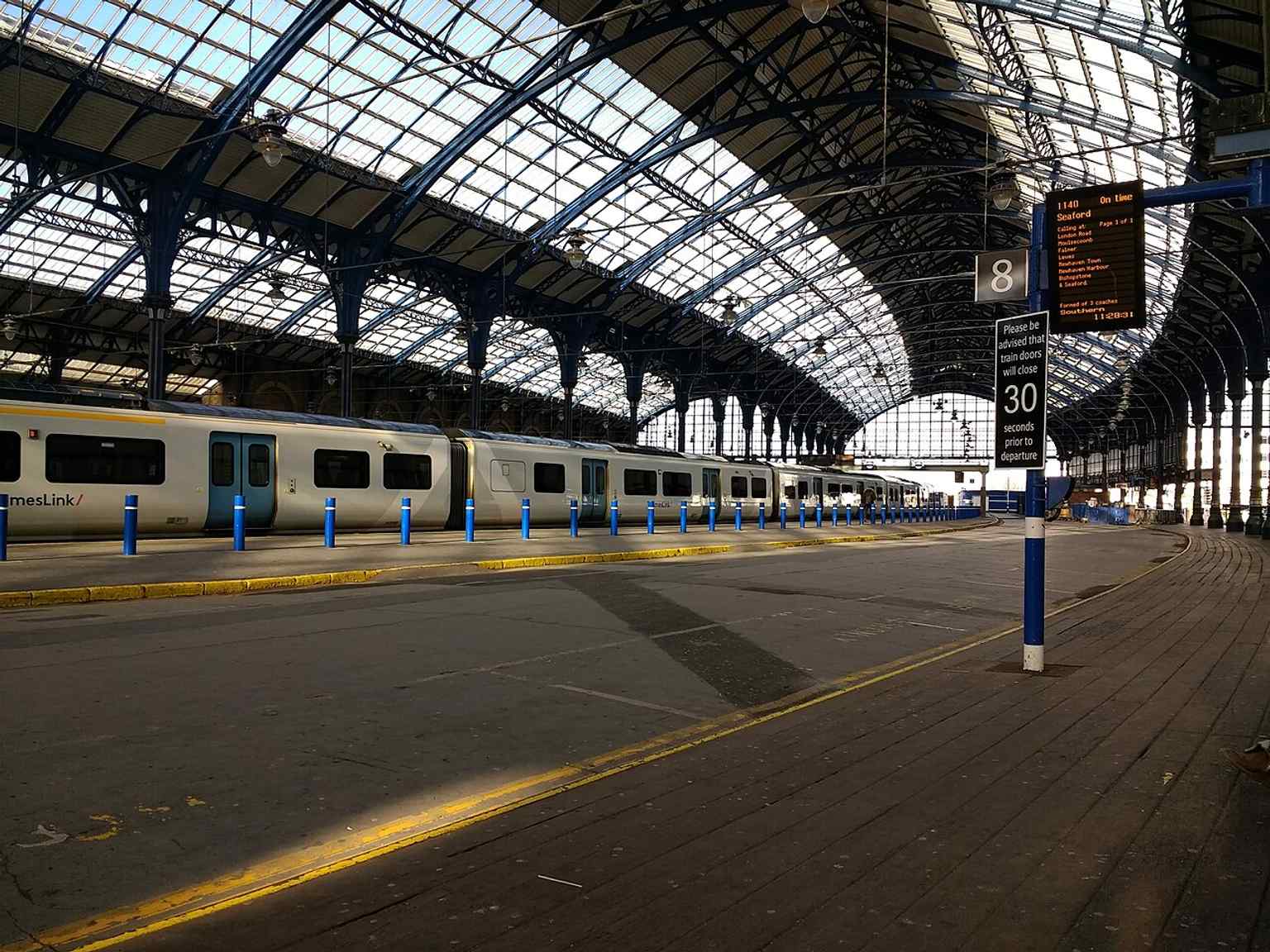 Platform 8 with a modern Class 700, showing how Brighton’s long platforms now handle today’s Thameslink and Southern services.