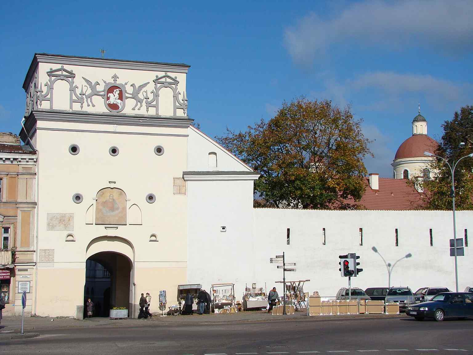 A clear street-level view of the Gate of Dawn in Vilnius Old Town, the last surviving city gate and a famous Marian pilgrimage site.