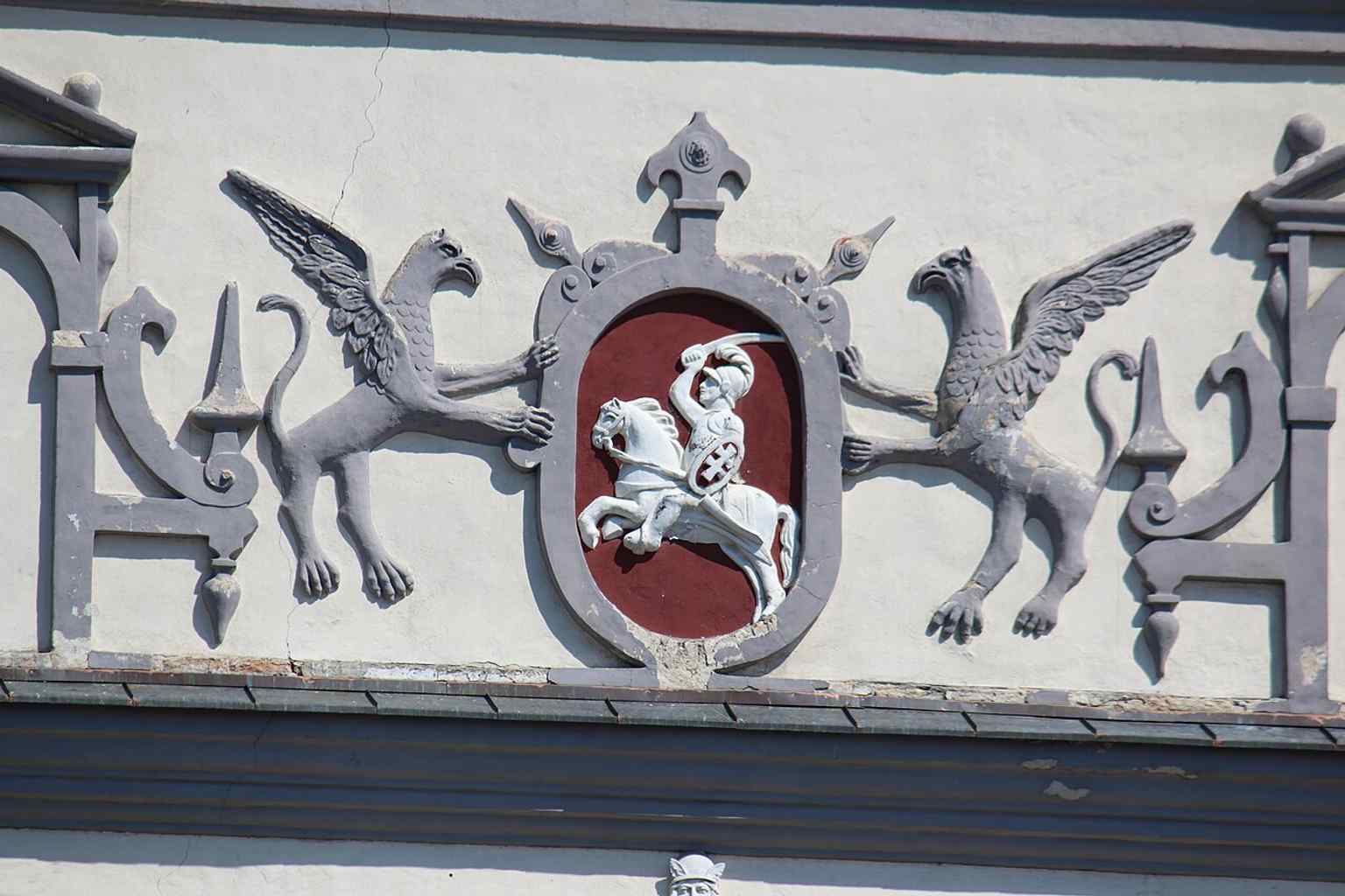 The Lithuanian coat of arms on the gate recalls how the shrine became a national symbol as well as a religious one.