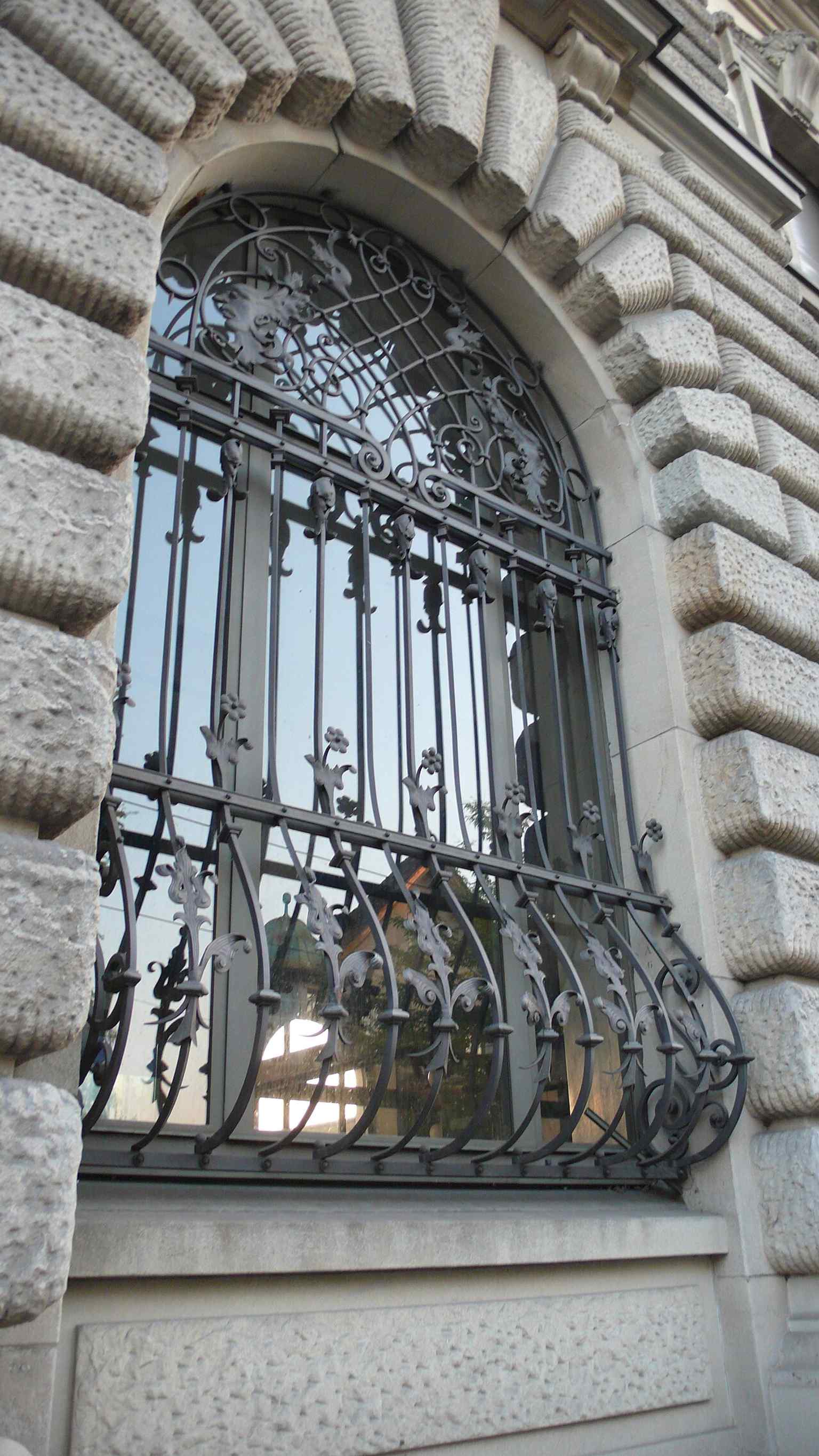 The old post office window highlights the building’s original public-facing service functions, before later alterations and extensions changed the complex.