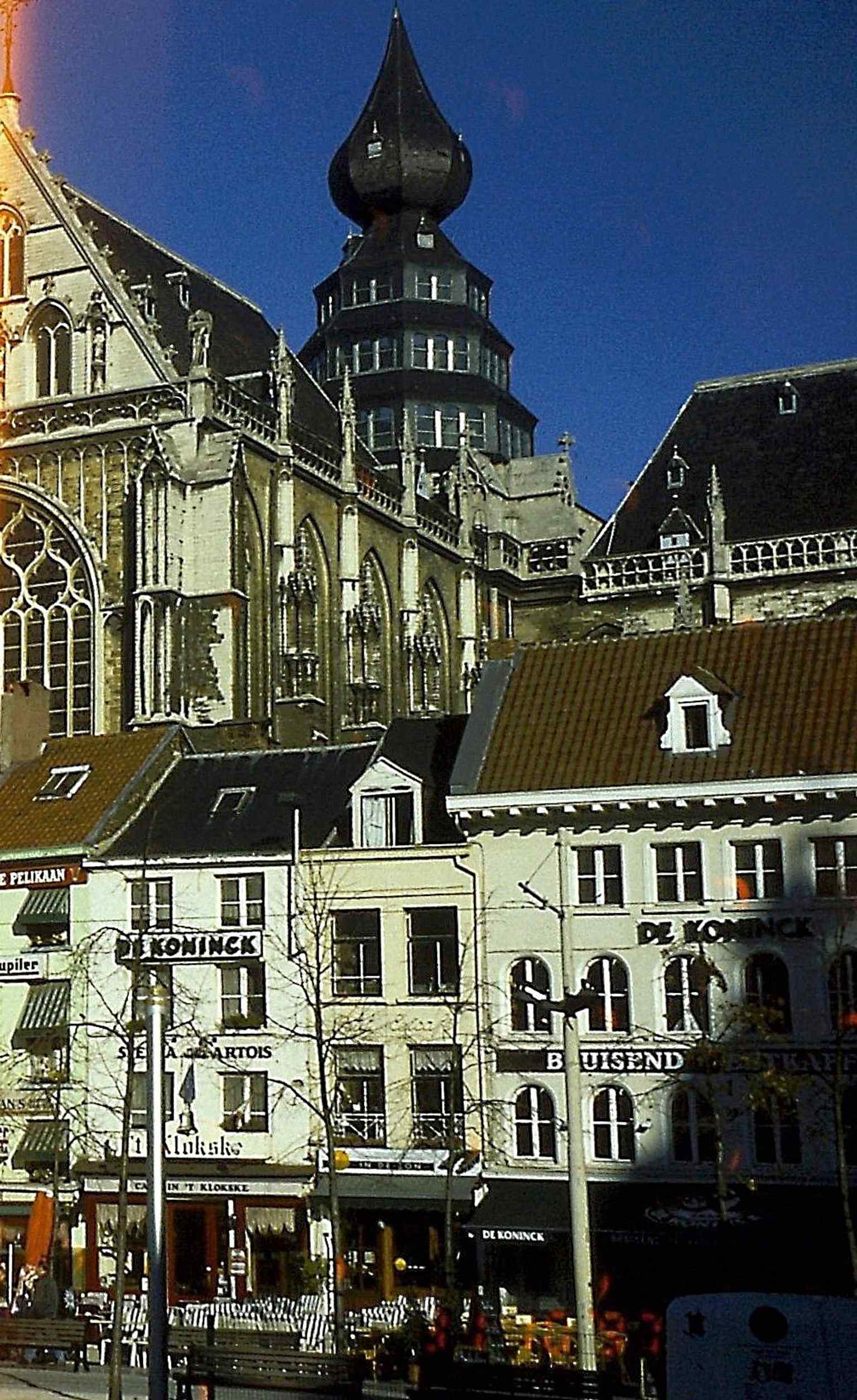 A north-side detail of the Groenplaats near the cathedral, showing the built edge of the square where historic facades line the open space.