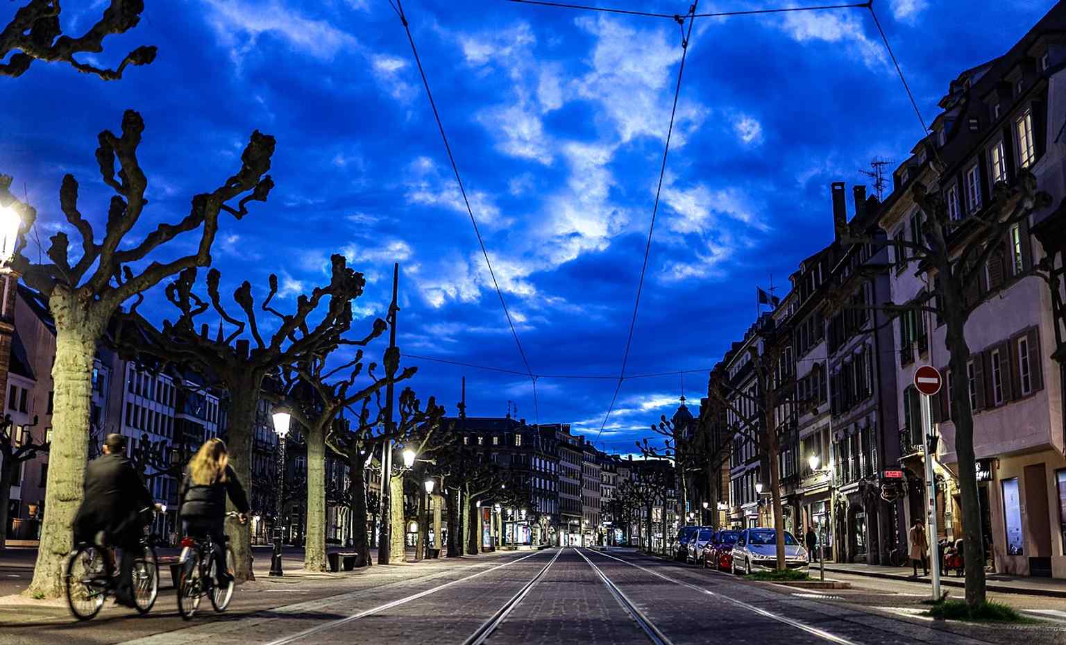 A broad atmospheric skyline view that can help set Place Broglie in Strasbourg’s historic center and river-city setting.