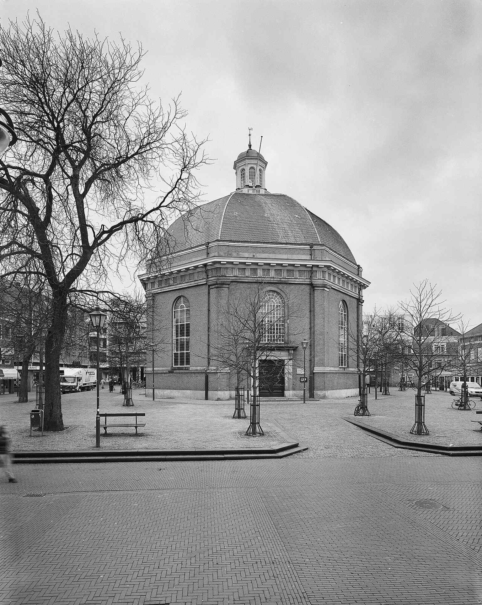 The west façade in a late-20th-century view, useful for showing the church’s neoclassical massing and urban setting in Arnhem.