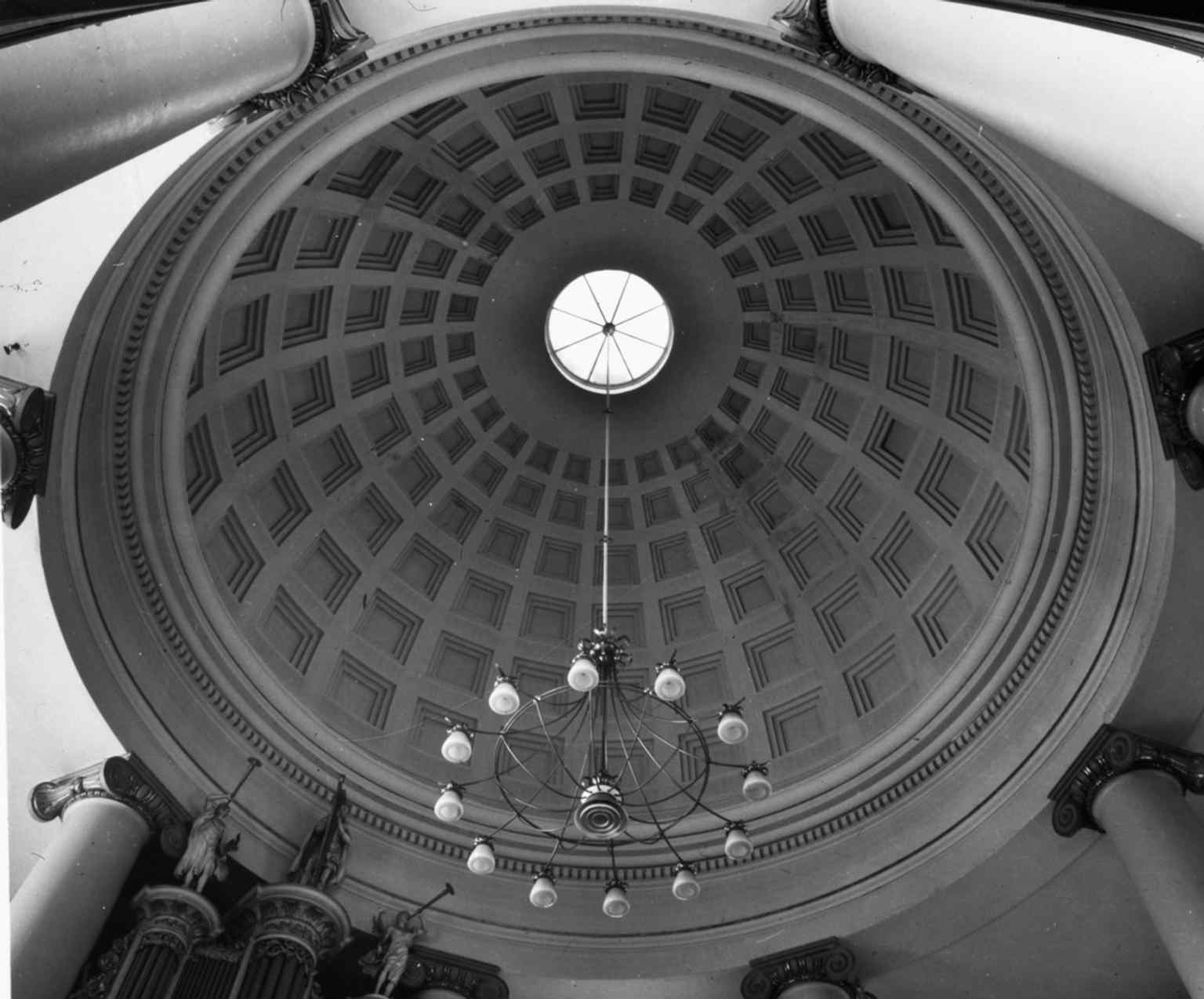 A detailed view of the coffered dome interior, ideal for highlighting the neoclassical ceiling design and its monumental scale.