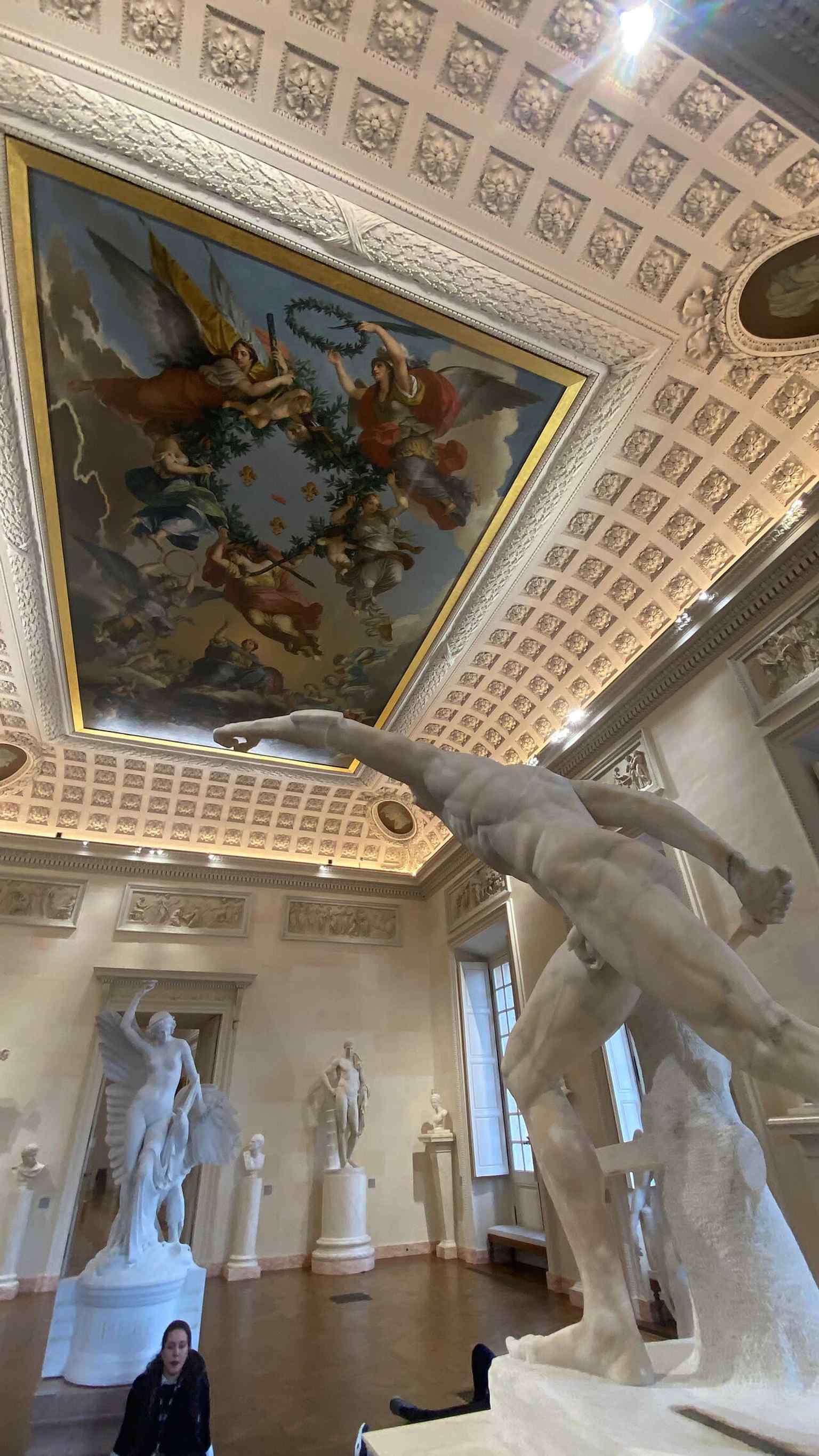 One of the museum's original rooms, the 'Salle des Statues,' initially designed to house sculptures, including plaster and marble copies of antiquities.