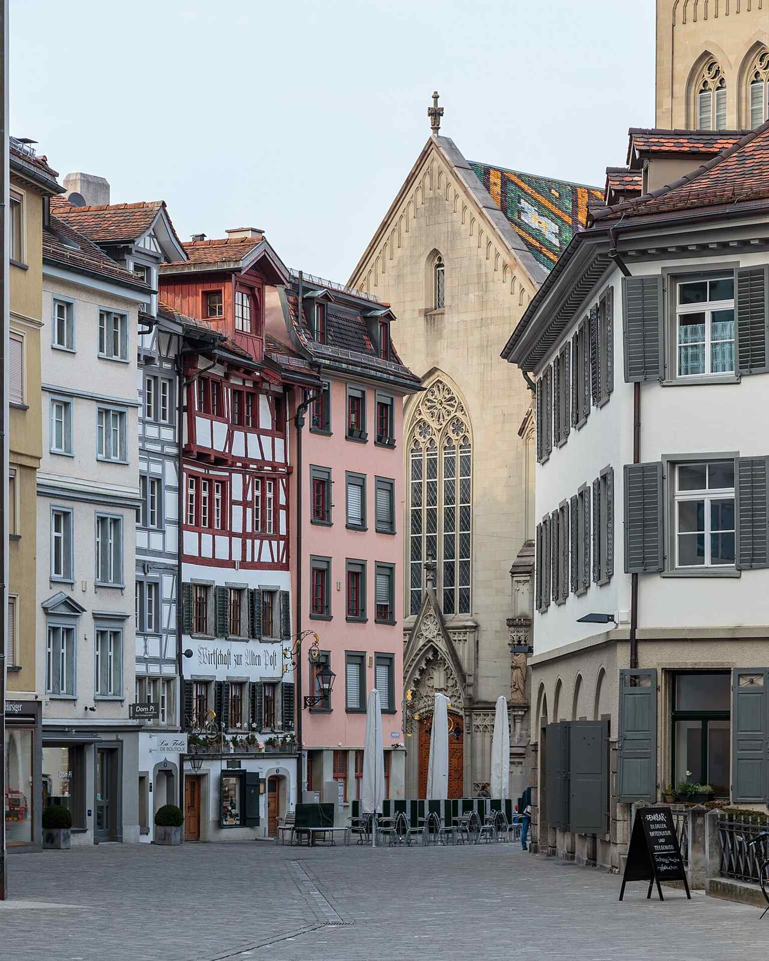 Gallusstrasse with St. Laurenzen Church in the background, reflecting the Reformation-era city center.