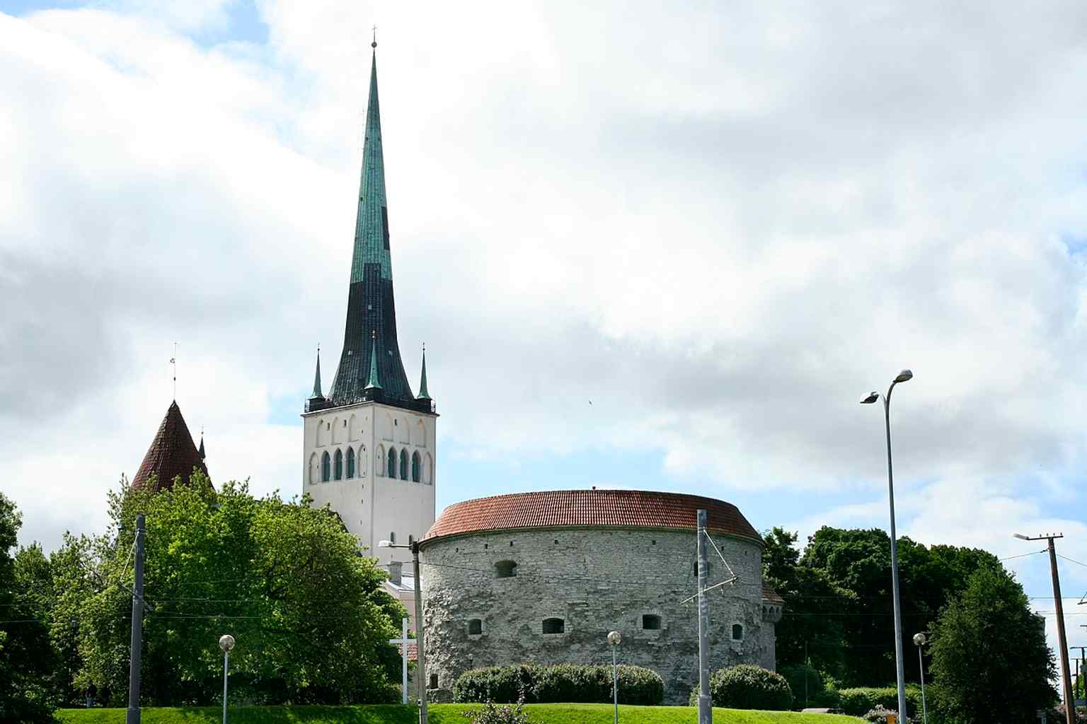 Seen near Fat Margaret and the Maritime Museum, this places St. Olaf’s in Tallinn’s historic harbor-edge cityscape.