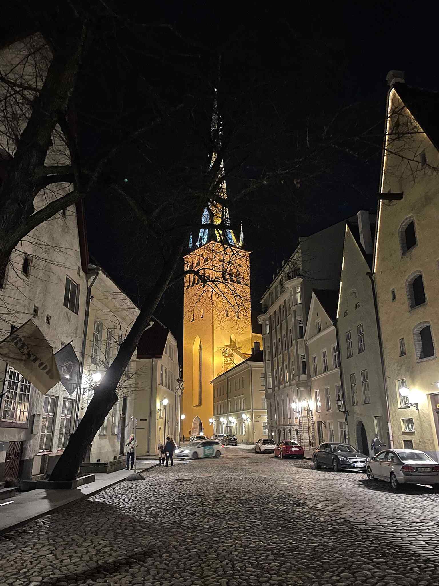 St. Olaf’s at night on Lai Street shows the church as a dramatic presence in Tallinn after dark.