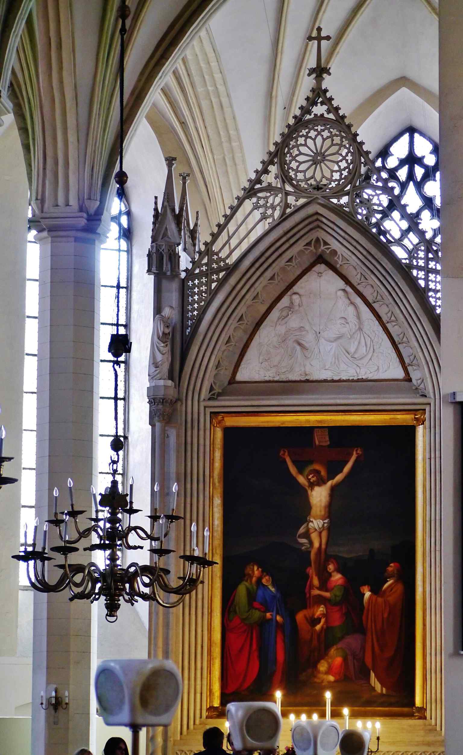 The altar inside St. Olaf’s Church, part of the postwar Protestant interior that supports modern worship.