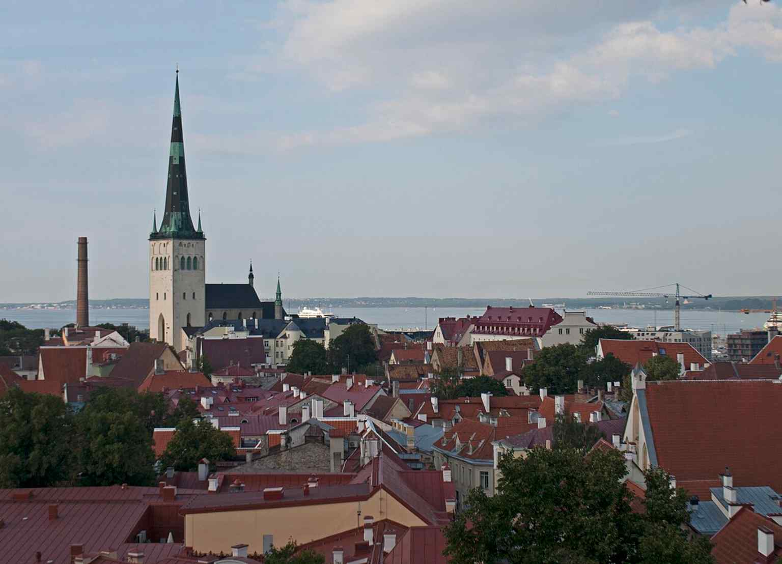 Seen from Kohtuotsa viewing platform, the church’s tower still stands out as the Old Town’s most recognizable vertical accent.