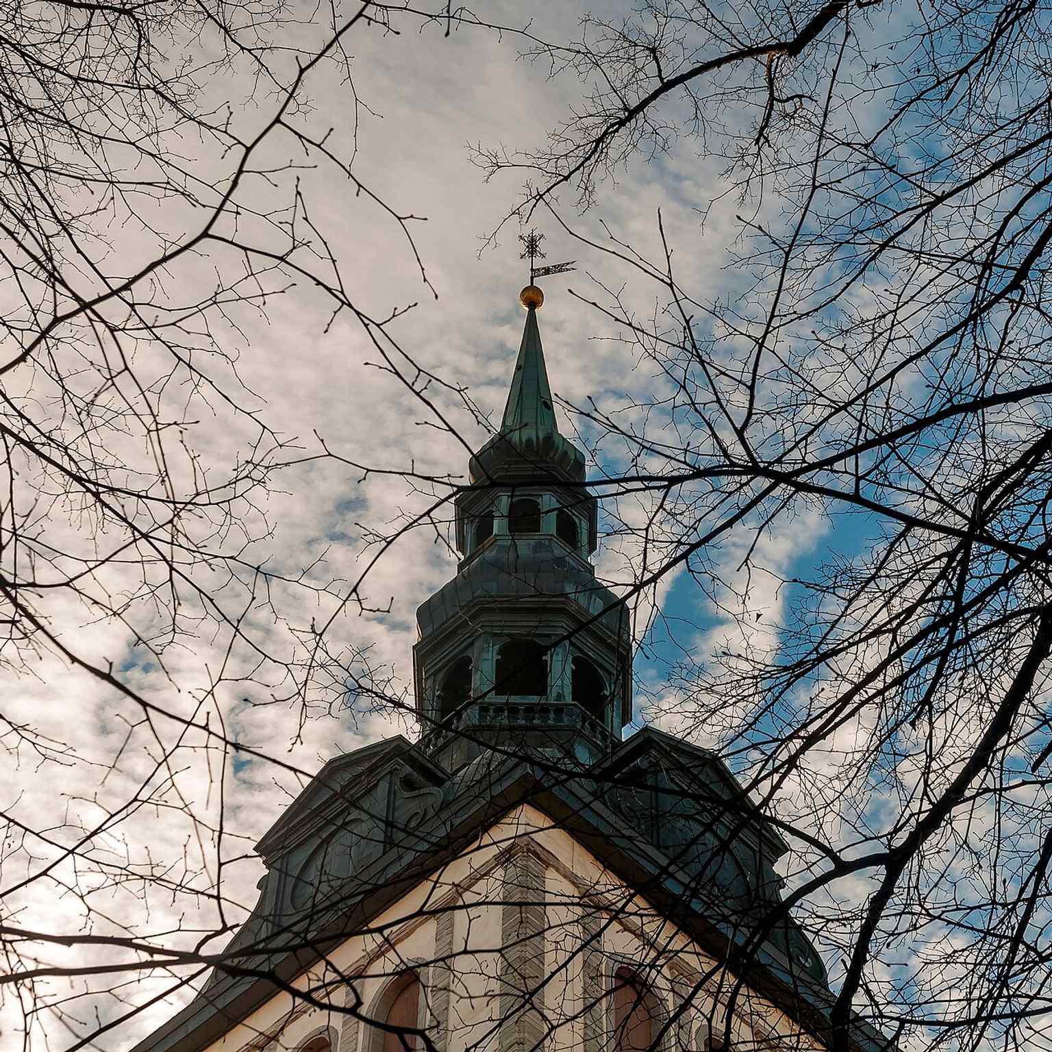 A frontal view of the church on Niguliste street, useful for showing its presence as a major monument in the Lower Town.