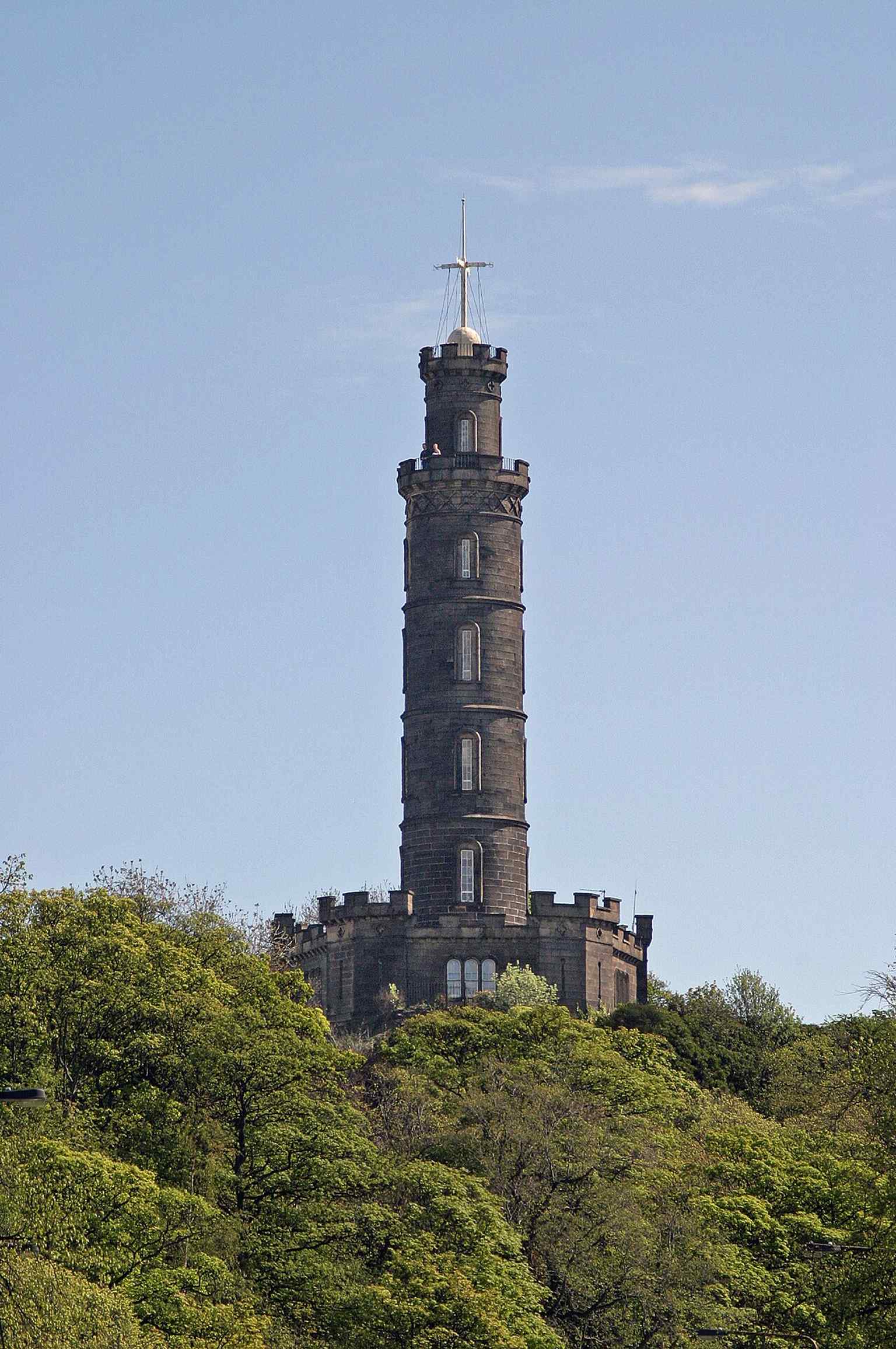 A clear classic view of the Nelson Monument on Calton Hill, showing the 32-metre tower completed in 1816 to honour Nelson after Trafalgar.