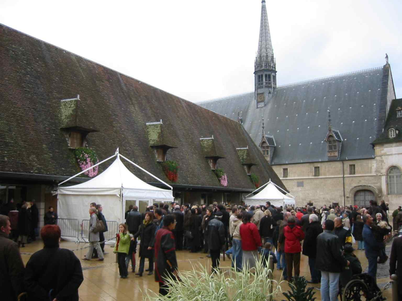 This photo captures the iconic Hôtel-Dieu de Beaune, founded in 1443, alongside the market halls where the world-renowned charity wine auction is now held.