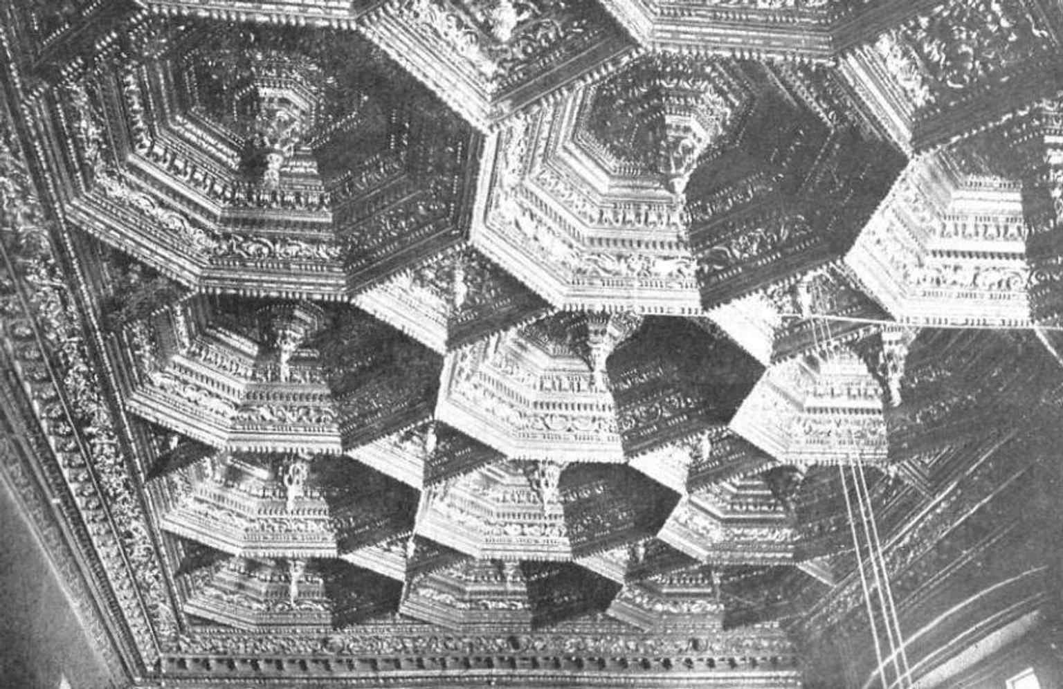 A rare 1911 archival view of the intricate, gold-leafed wooden ceiling found inside the Sala Dorada.
