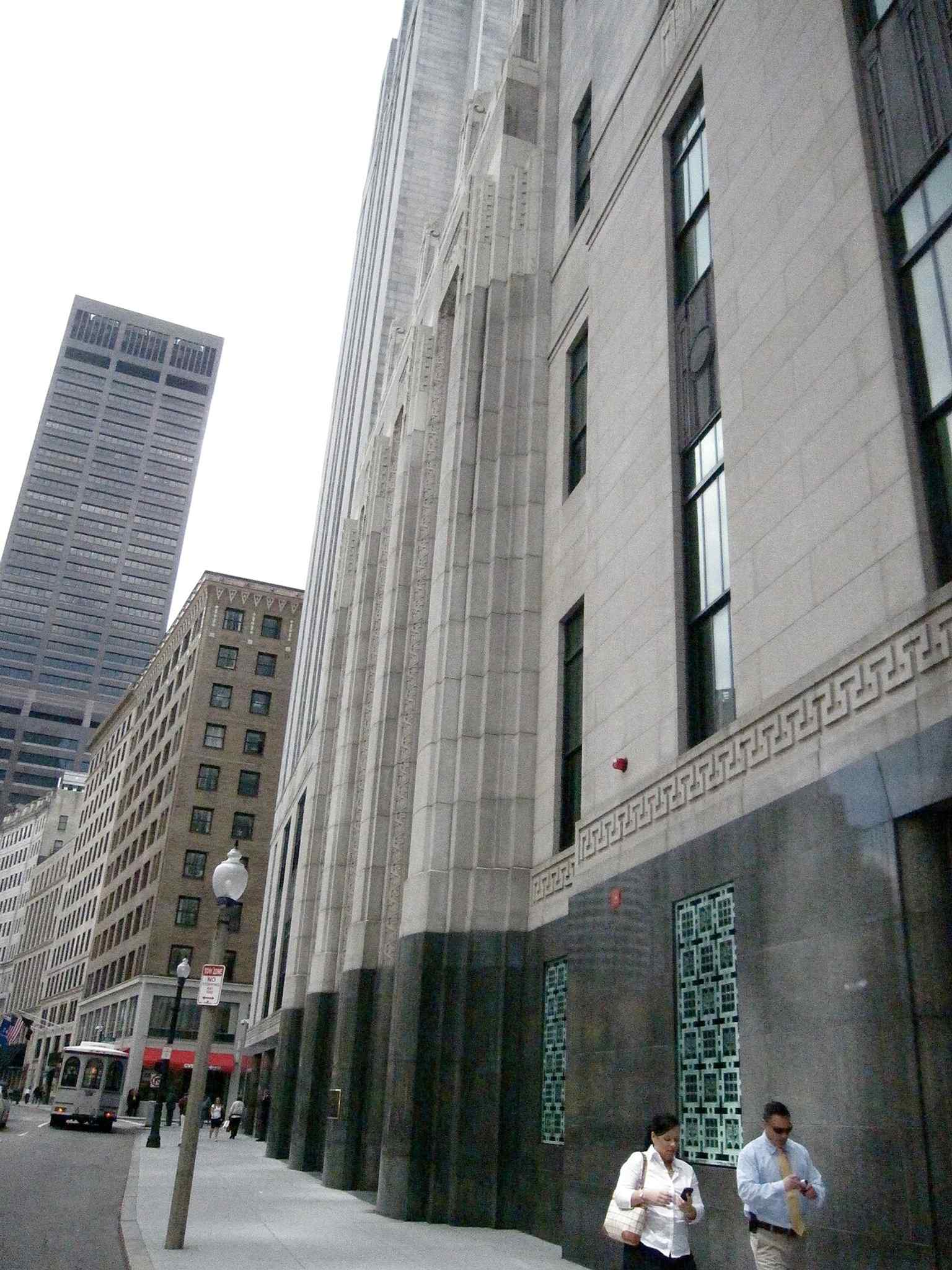 The John W. McCormack Post Office and Courthouse, the modern government building that fronts the square.