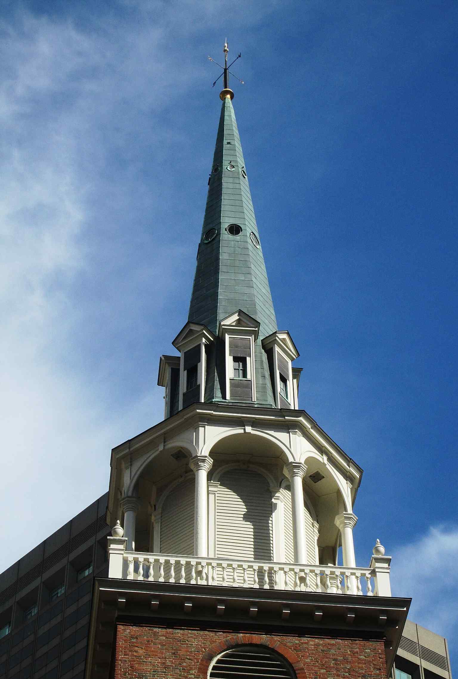 The Old South Meeting House steeple rises above Downtown Boston, recalling the 1729 church that became the rallying point for the Boston Tea Party.