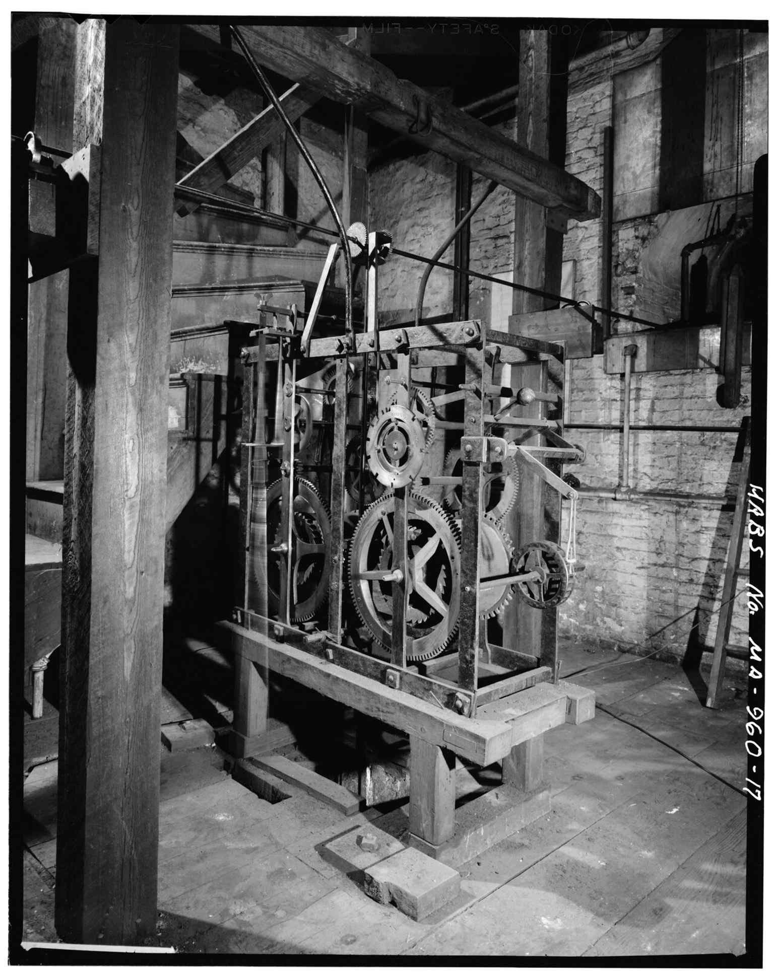 The tower clock mechanism highlights the building’s historic steeple and its role as a civic gathering place.