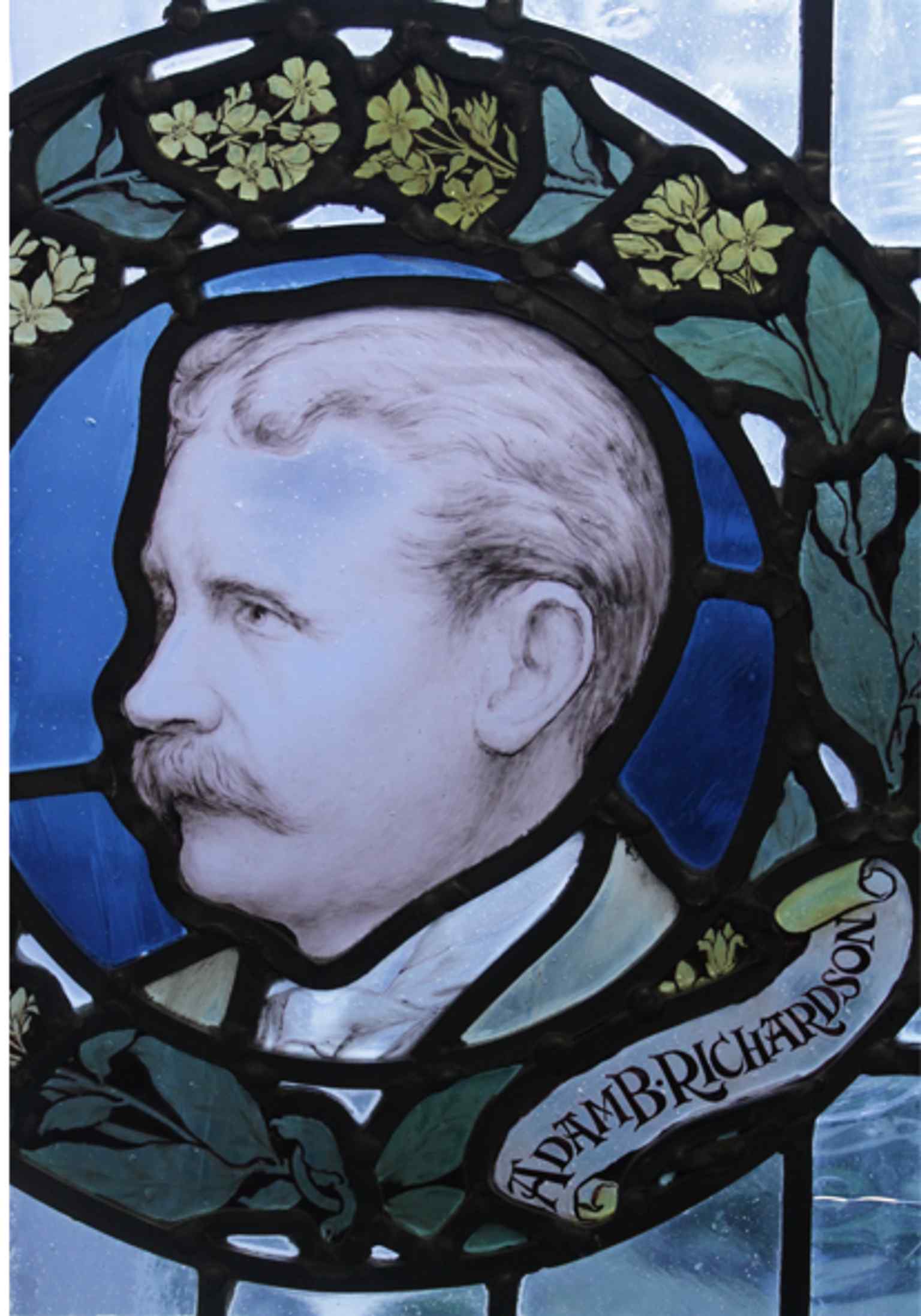 A stained-glass portrait window, part of the building’s layered interior decoration and the kind of detail revealed in the refurbishment.