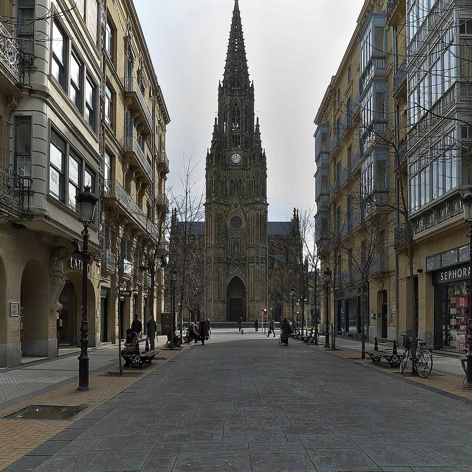 A close view of the 75-meter bell tower, echoing the Cologne-inspired spire described in the source.