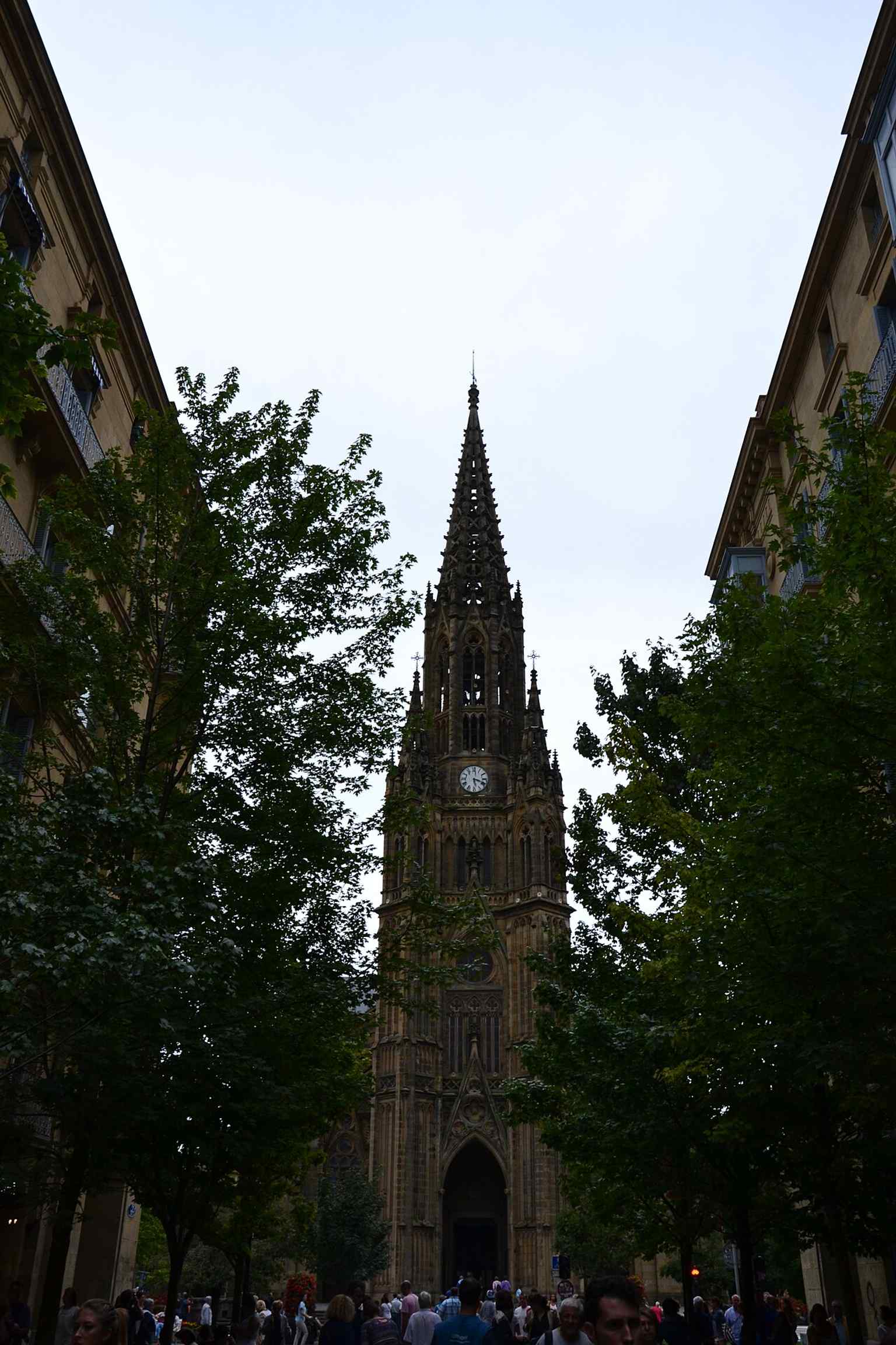 A full-height exterior view of the cathedral, ideal for showing the scale of the building above the street.