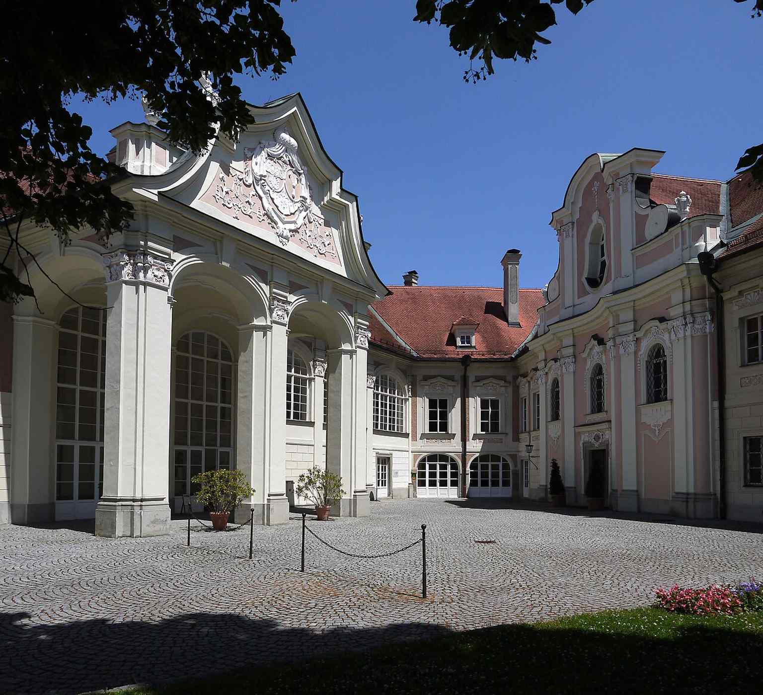 A classic view of Schloss Lamberg from Ennsdorf, highlighting how the castle dominates the hillside above the river confluence.