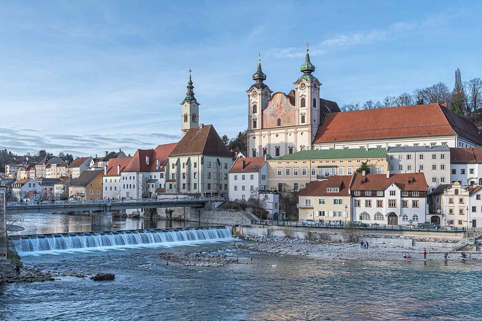 Another strong landscape view of the Michaelerkirche within the riverside ensemble at the meeting of the Steyr and Enns.