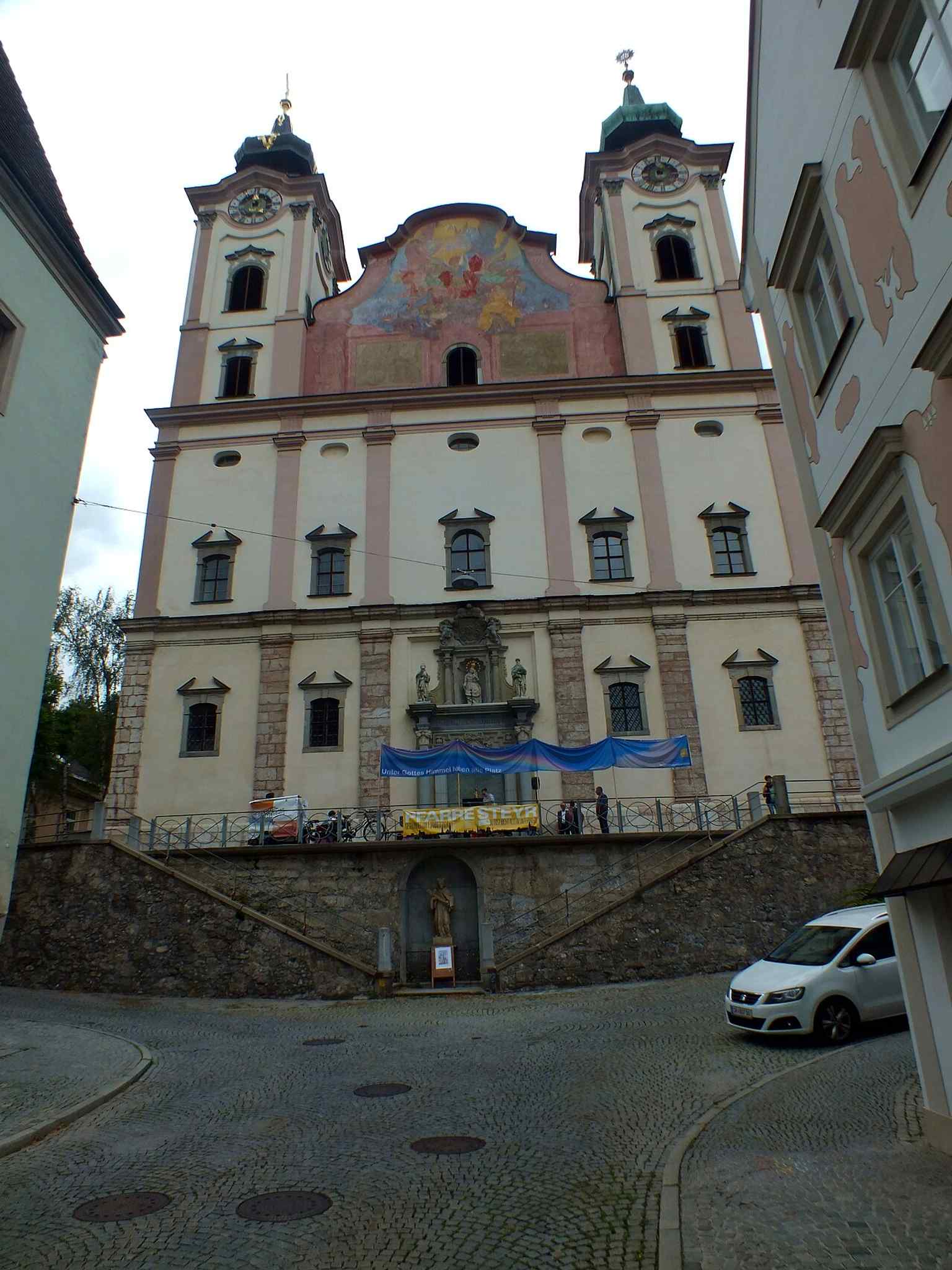 A recent street-level view of the church façade, showing that St. Michael still anchors public life at Michaelerplatz.