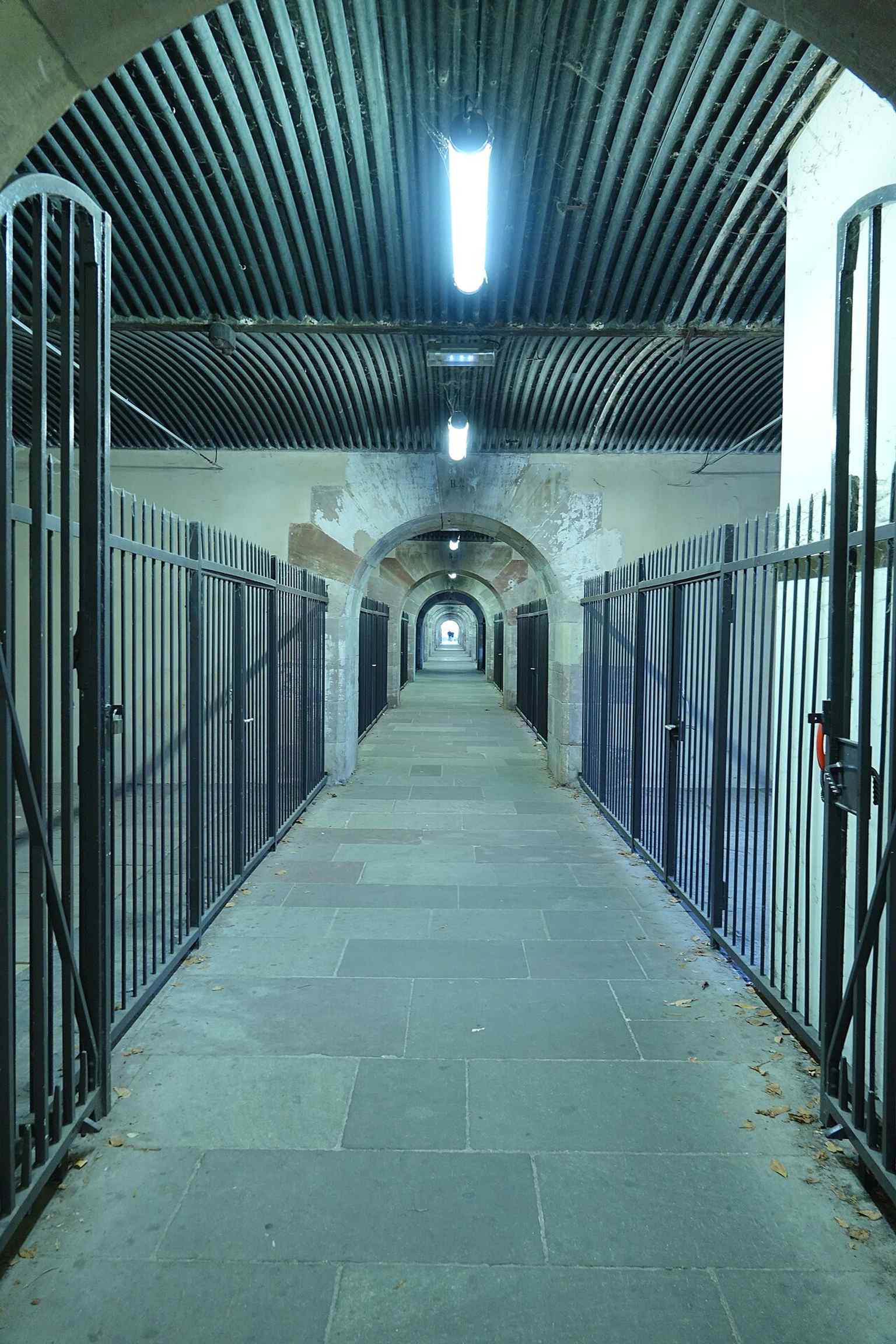 The interior of the dam in 2021, illustrating the restored passage that visitors now cross instead of soldiers.