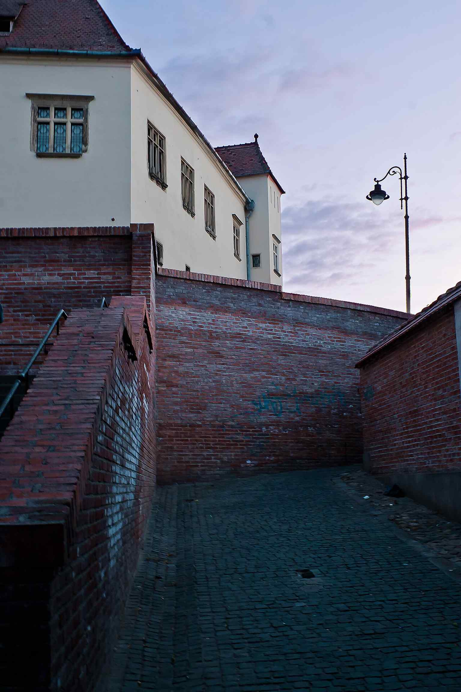 View of the museum from the stairway passage, evoking the historical significance of the building's stairs, where Emperor Joseph II famously received petitions directly from citizens in 1773.