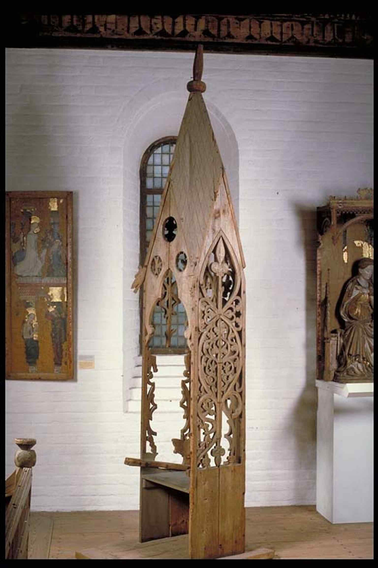 A medieval choir stall from Burs Church, part of the museum’s extensive ecclesiastical art collection.