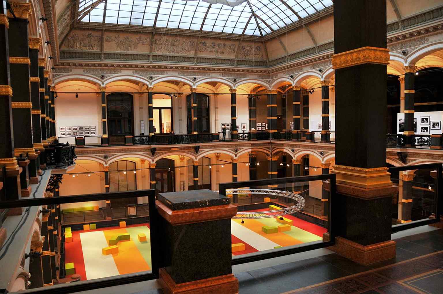 Inside the building’s exhibition hall, where the rooms open around the central atrium that defines Gropius Bau.