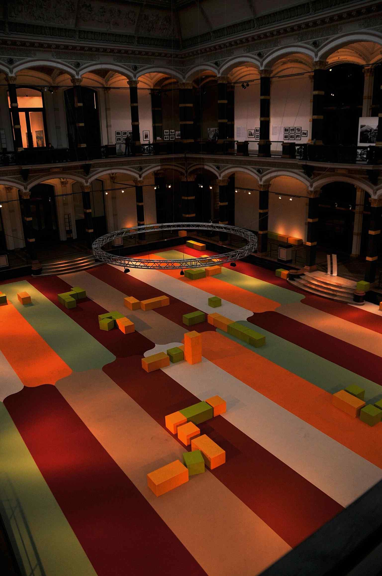 The luminous atrium and lightwell, echoing the building’s original museum-and-school layout around a central court.