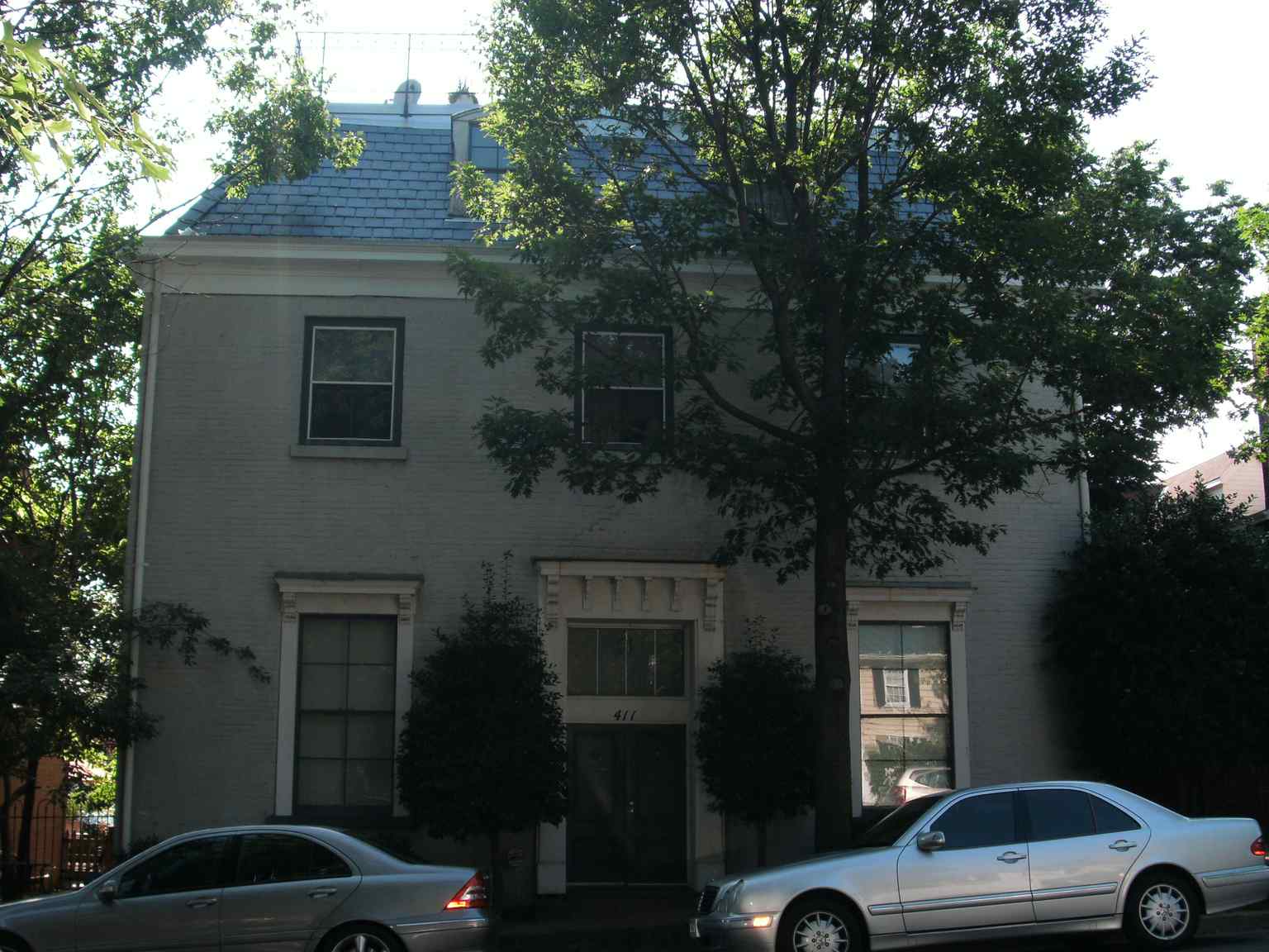 The Odd Fellows Hall as it appeared in 2009, showing the historically significant exterior with its distinctive slate mansard roof, which was preserved even after its conversion to condominiums in the 1980s.