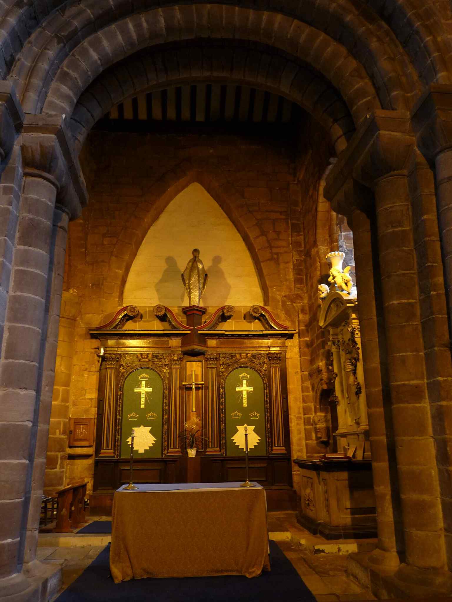 The Lady Chapel, extended in 1925, where later devotional changes sit beside the church’s older medieval structure.