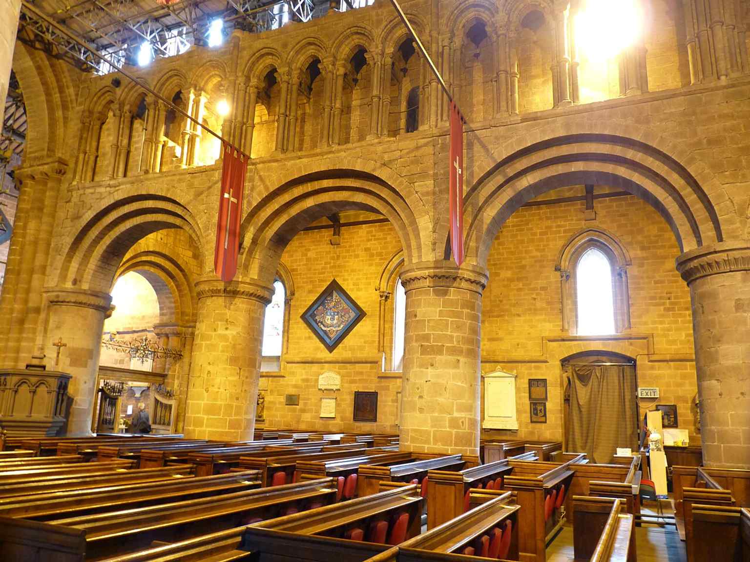 The south side of the nave, useful for showing the broad interior plan of nave and aisles that survived from the medieval church.