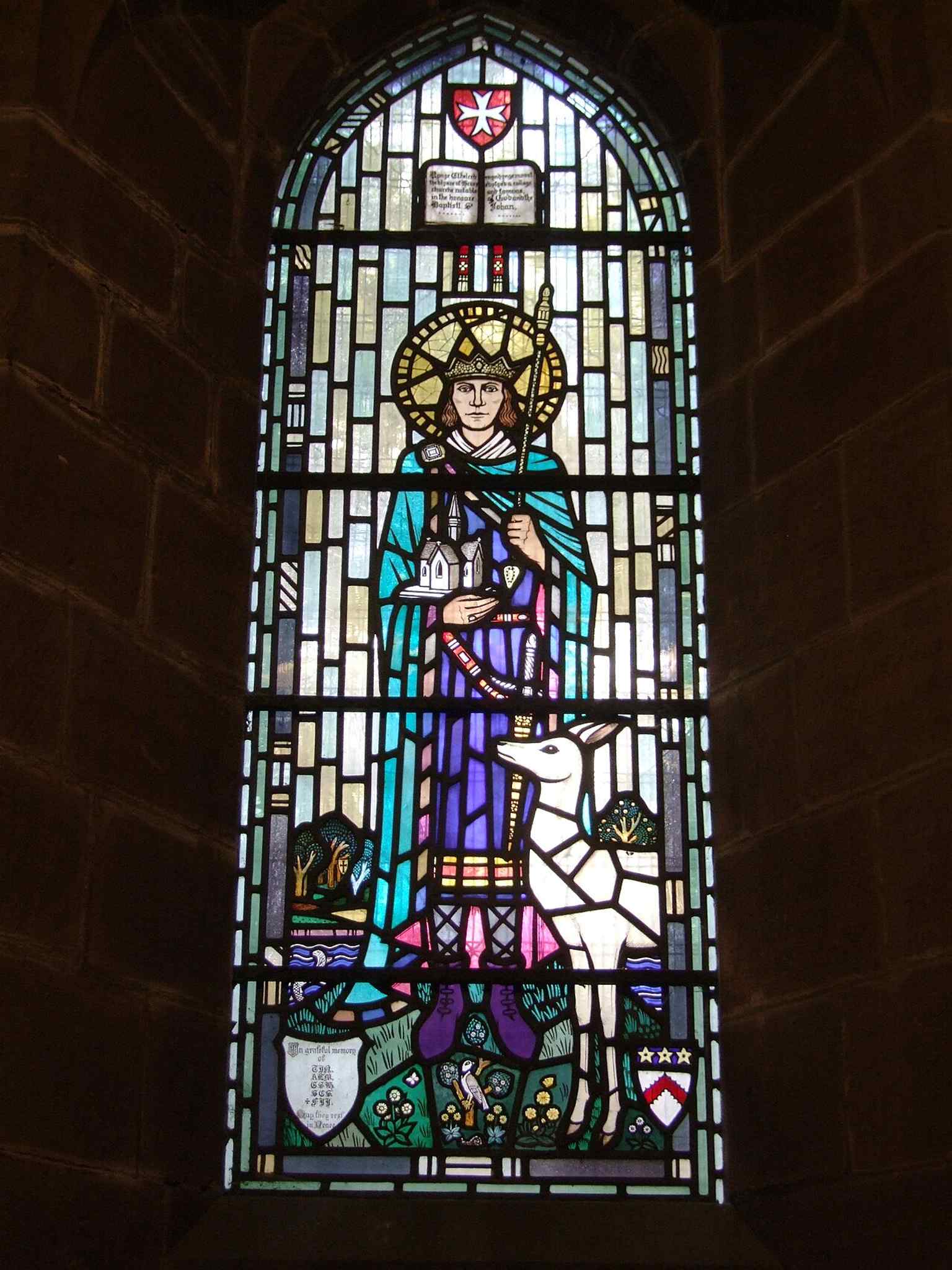St Ethelred in stained glass, linking the church to its legendary late-7th-century foundation by King Æthelred.