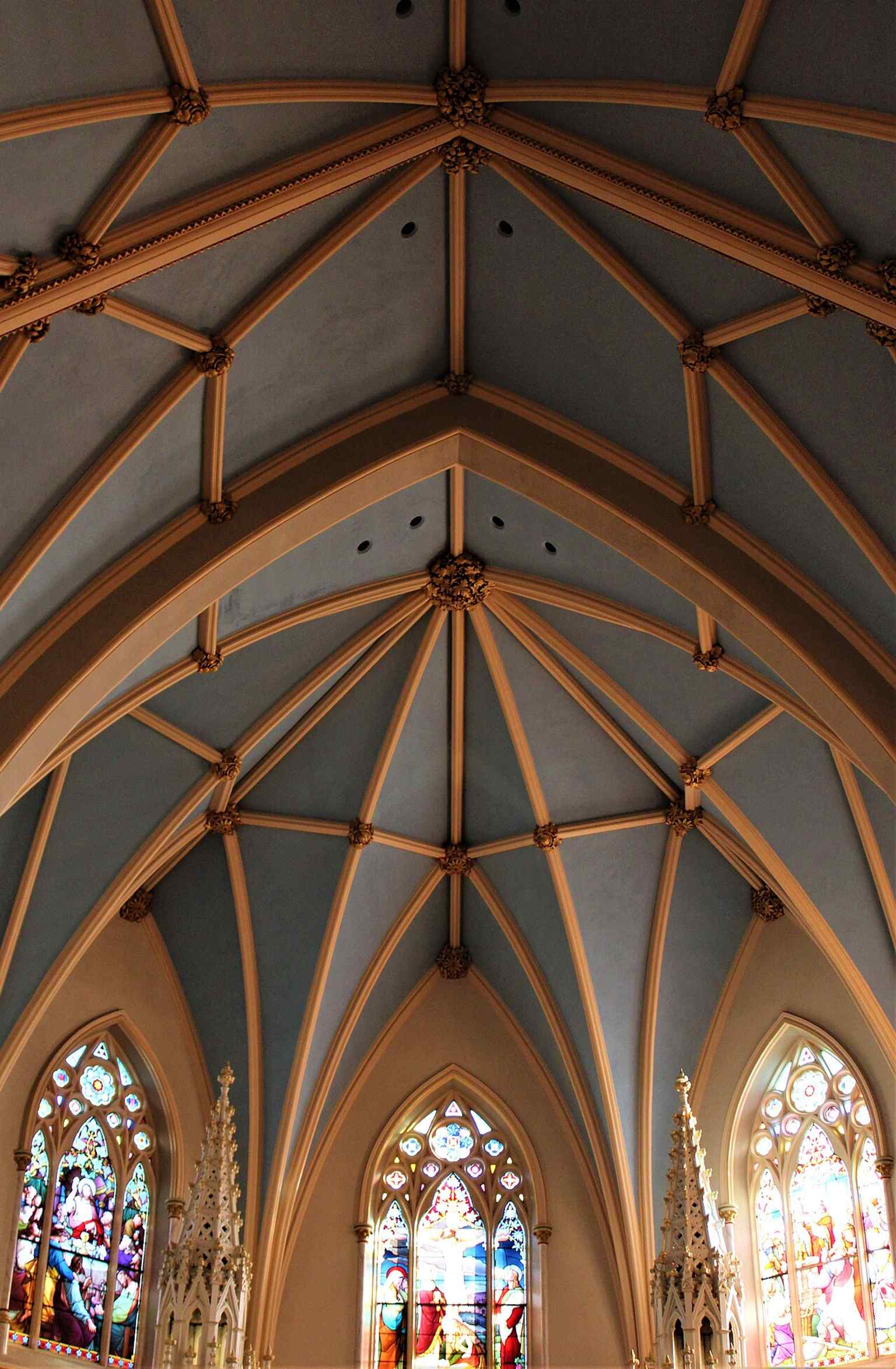 Stained glass in the cathedral interior, one of the decorative features that gives the church its historic character.