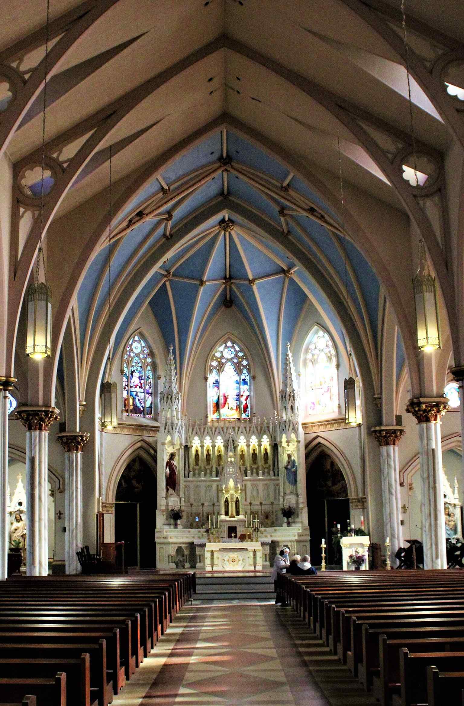 A closer interior crop that can help focus on the sanctuary’s details and the cathedral’s restored sacred art.