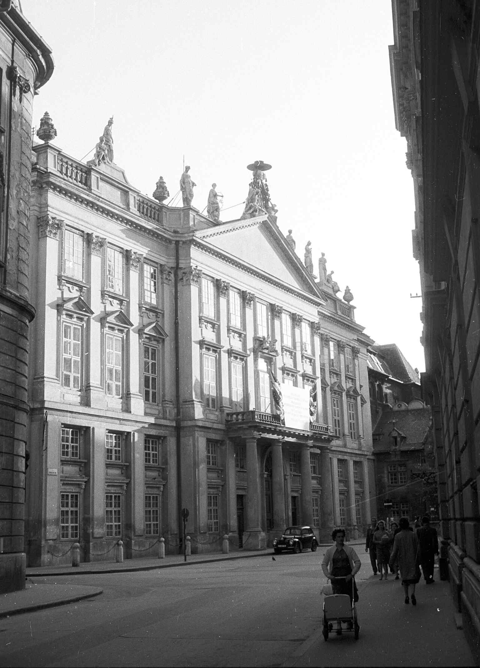 A vintage street-level view shows the palace in an earlier urban setting, useful for telling the story of how it survived and changed through the 20th century.