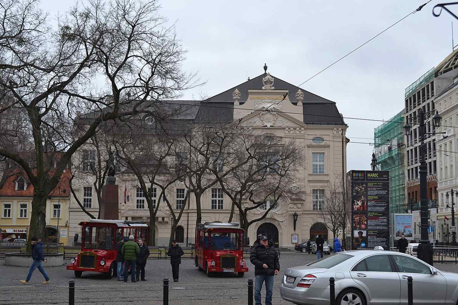 A clear view of the landmark’s monumental exterior, whose lavish historicist decoration made it one of Bratislava’s most representative concert buildings.