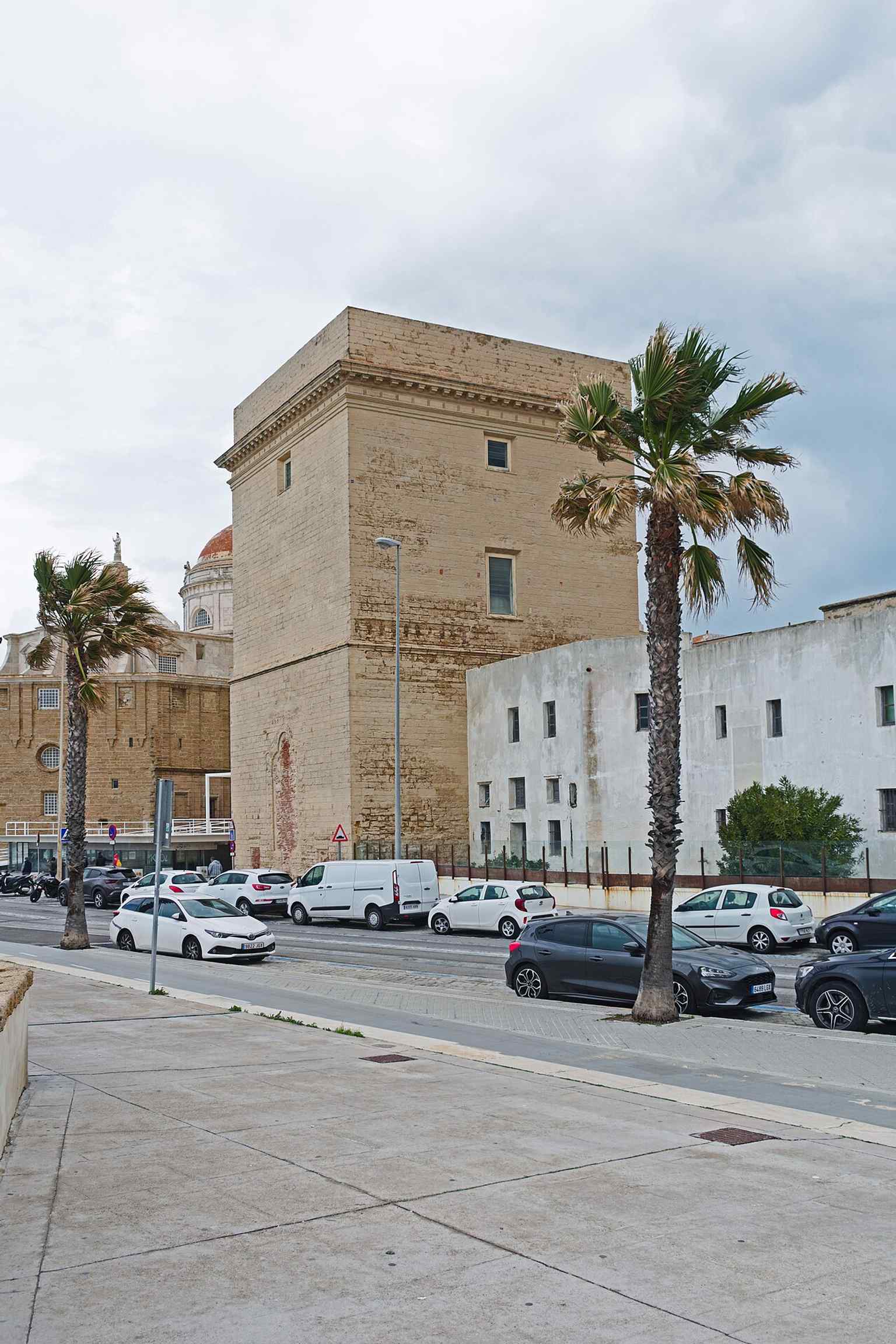 The Torre del Sagrario, a separate tower linked to the cathedral complex, reflecting the church’s later Baroque additions and polychrome tilework.
